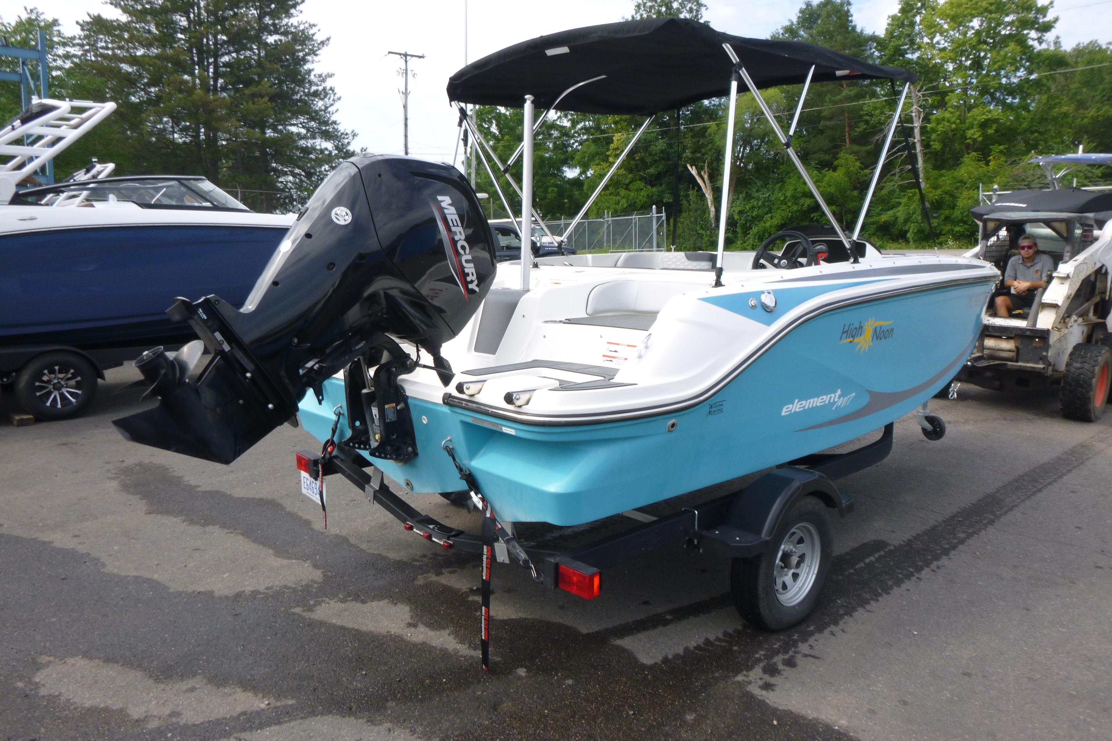 2022 Bayliner Element M17 boat with Mercury outboard motor, parked on a trailer.