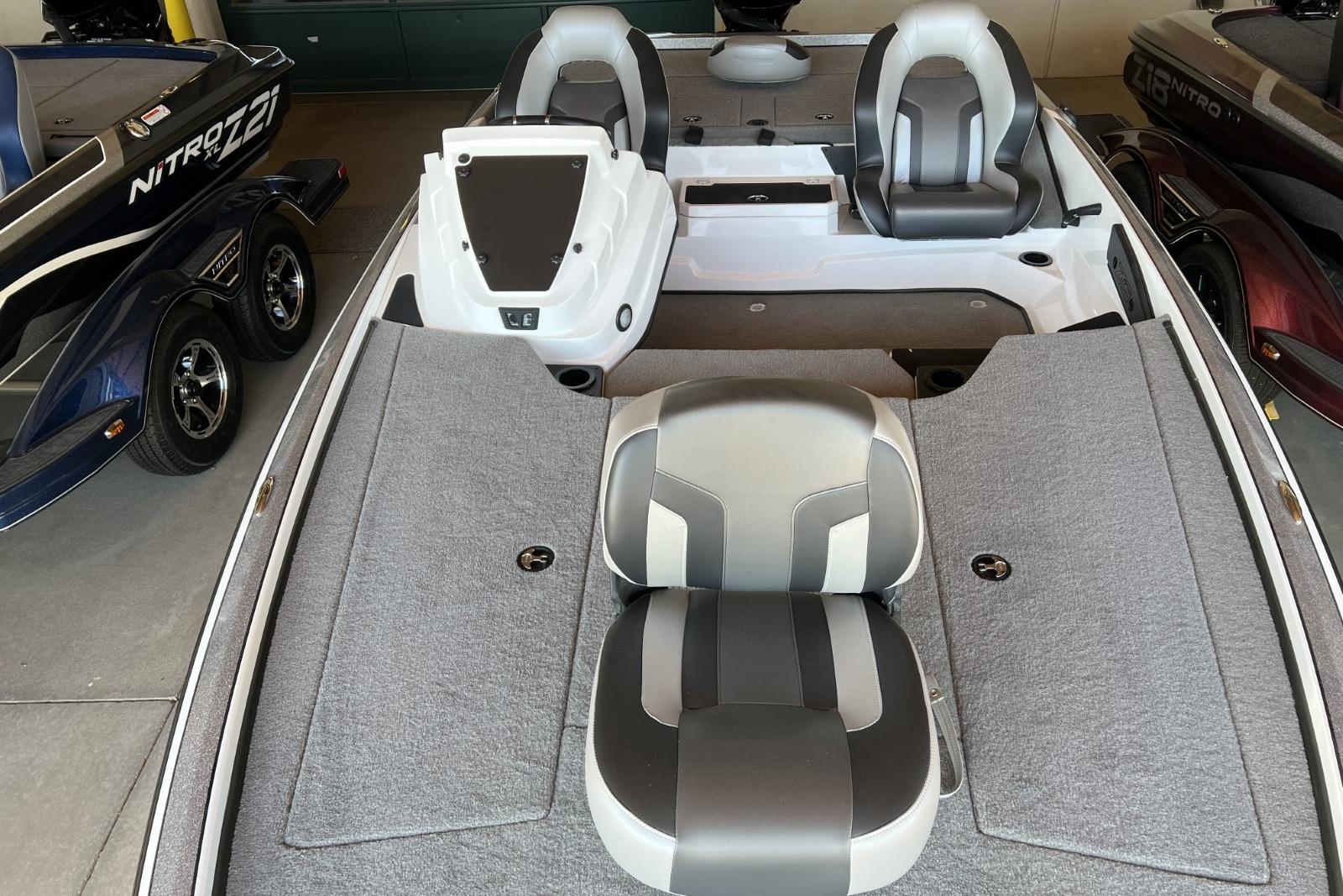 2025 Nitro Z19 boat interior with gray seating and spacious deck layout.