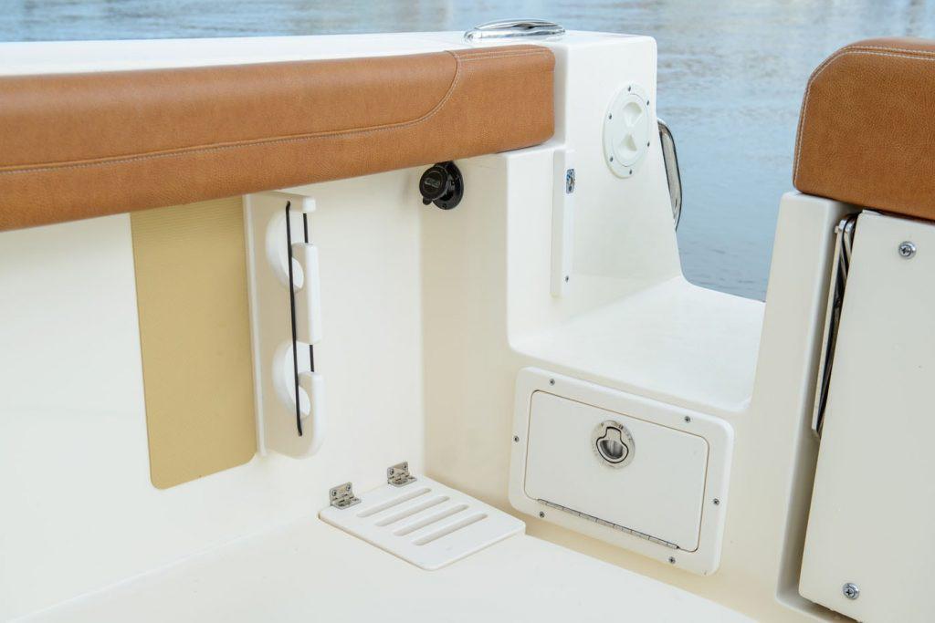 Manufacturer Provided Image: 2023 Scout 255 Dorado boat interior with tan seating and storage compartments.