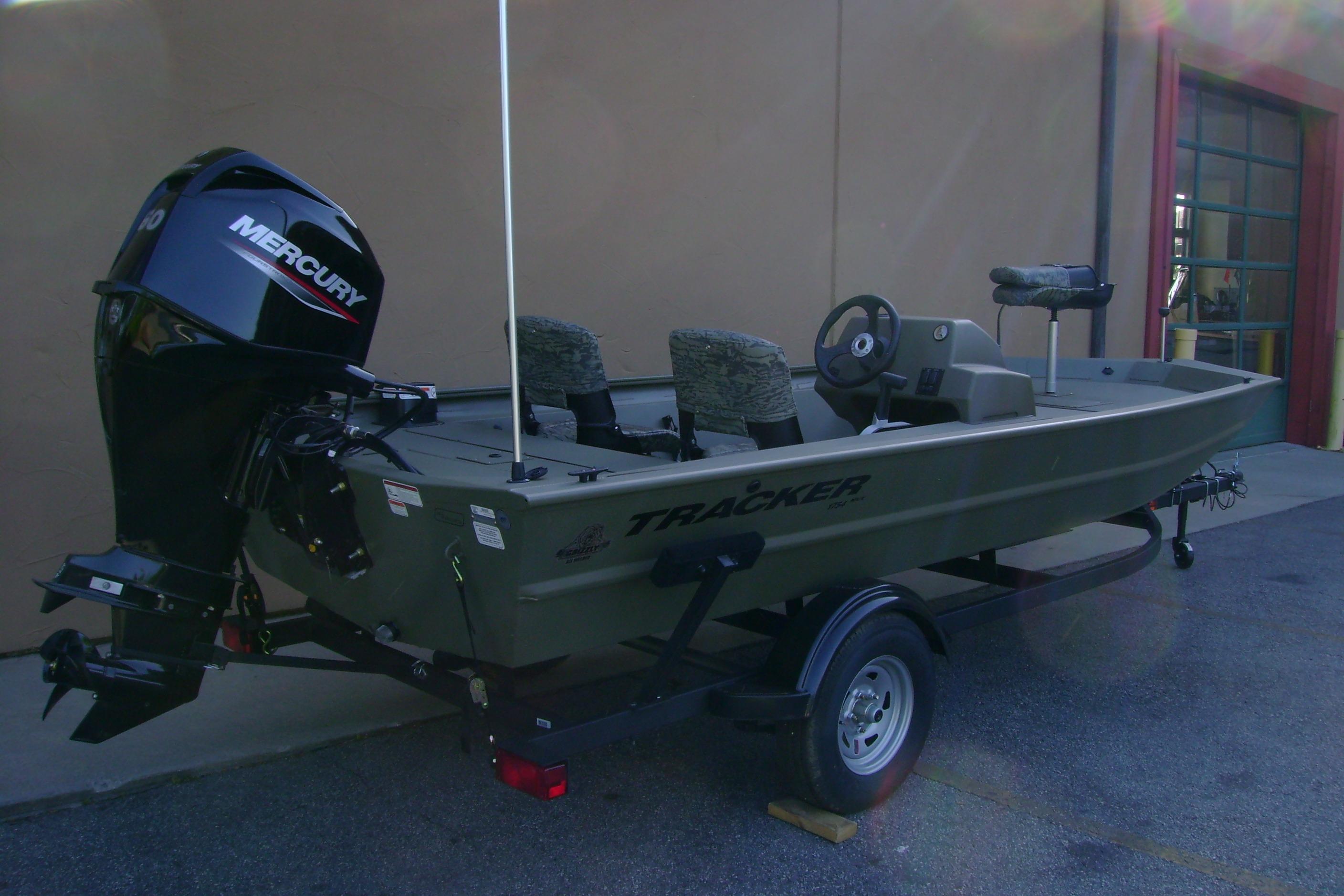 2026 Tracker Grizzly 1754 SC boat with Mercury engine on trailer.
