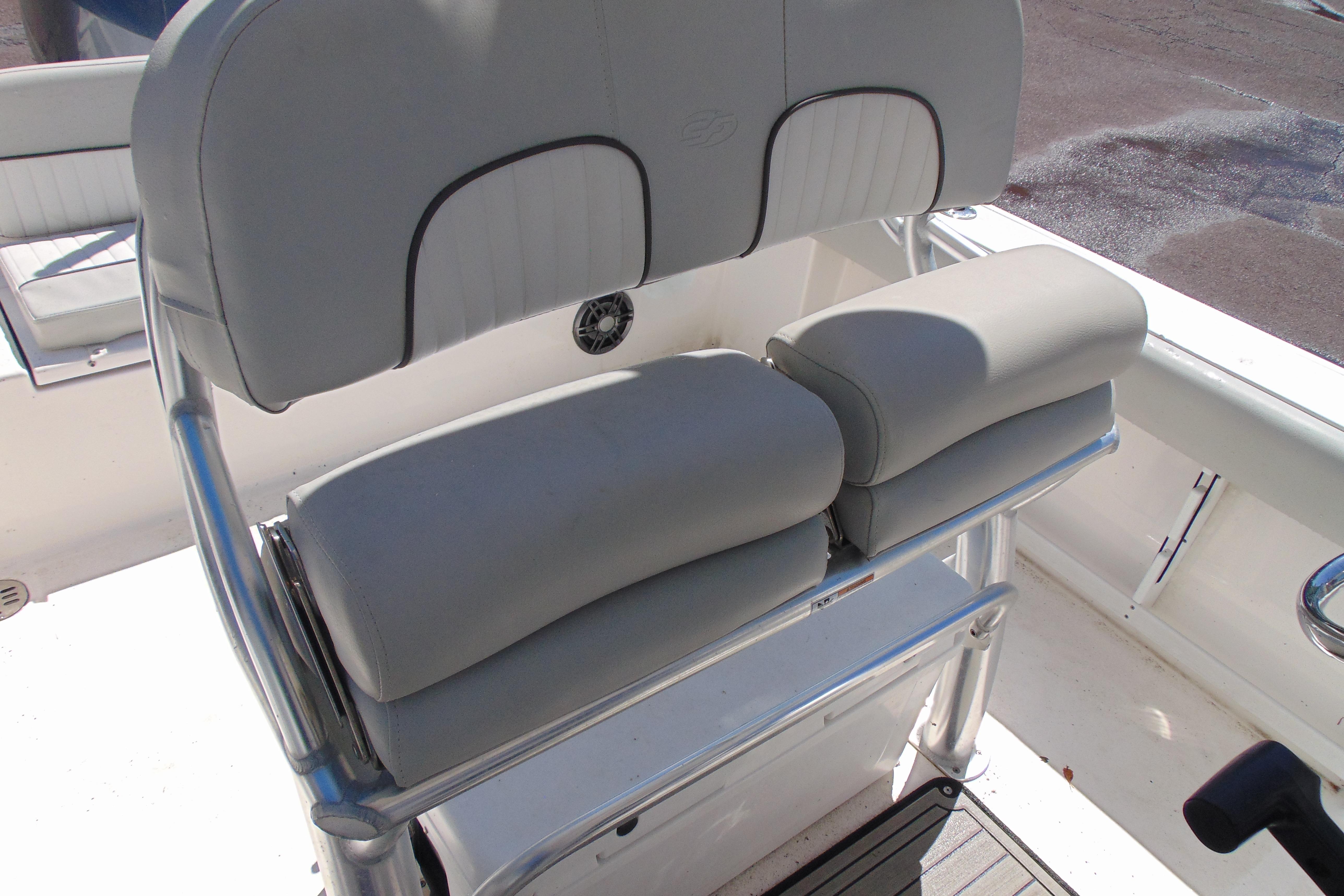 2022 Sea Fox 248 Commander boat seating with cushioned backrest and armrests.