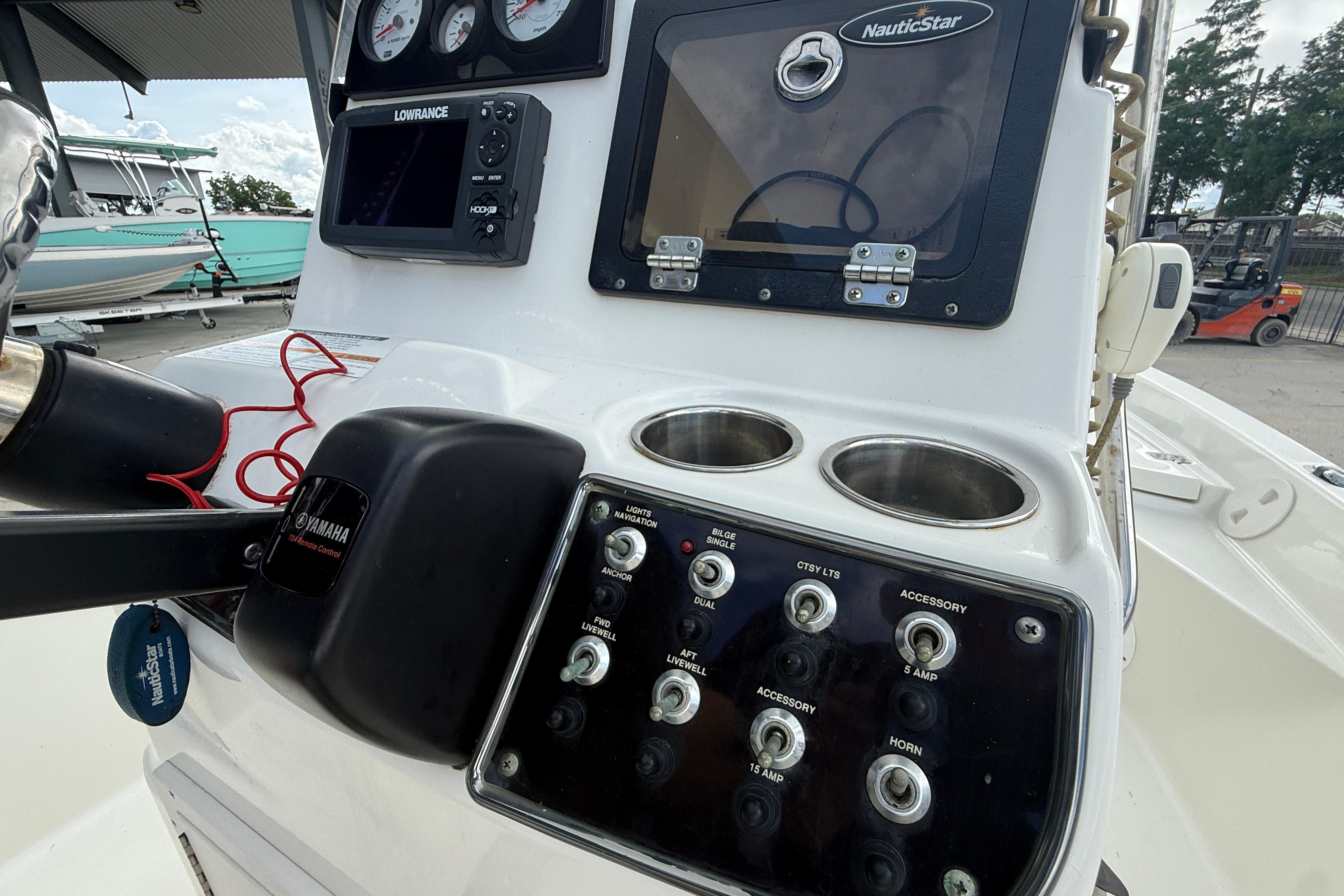2017 NauticStar 1910 NauticBay boat dashboard with Yamaha controls and Lowrance display.