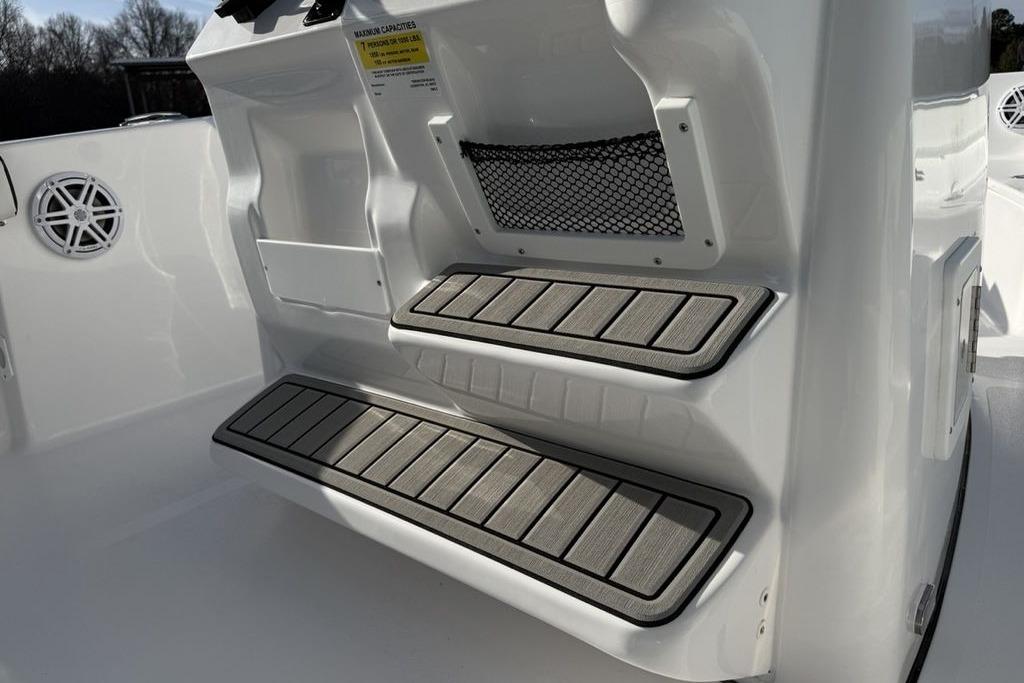 2026 Tidewater 198 CC Adventure boat interior with non-slip steps and storage net.