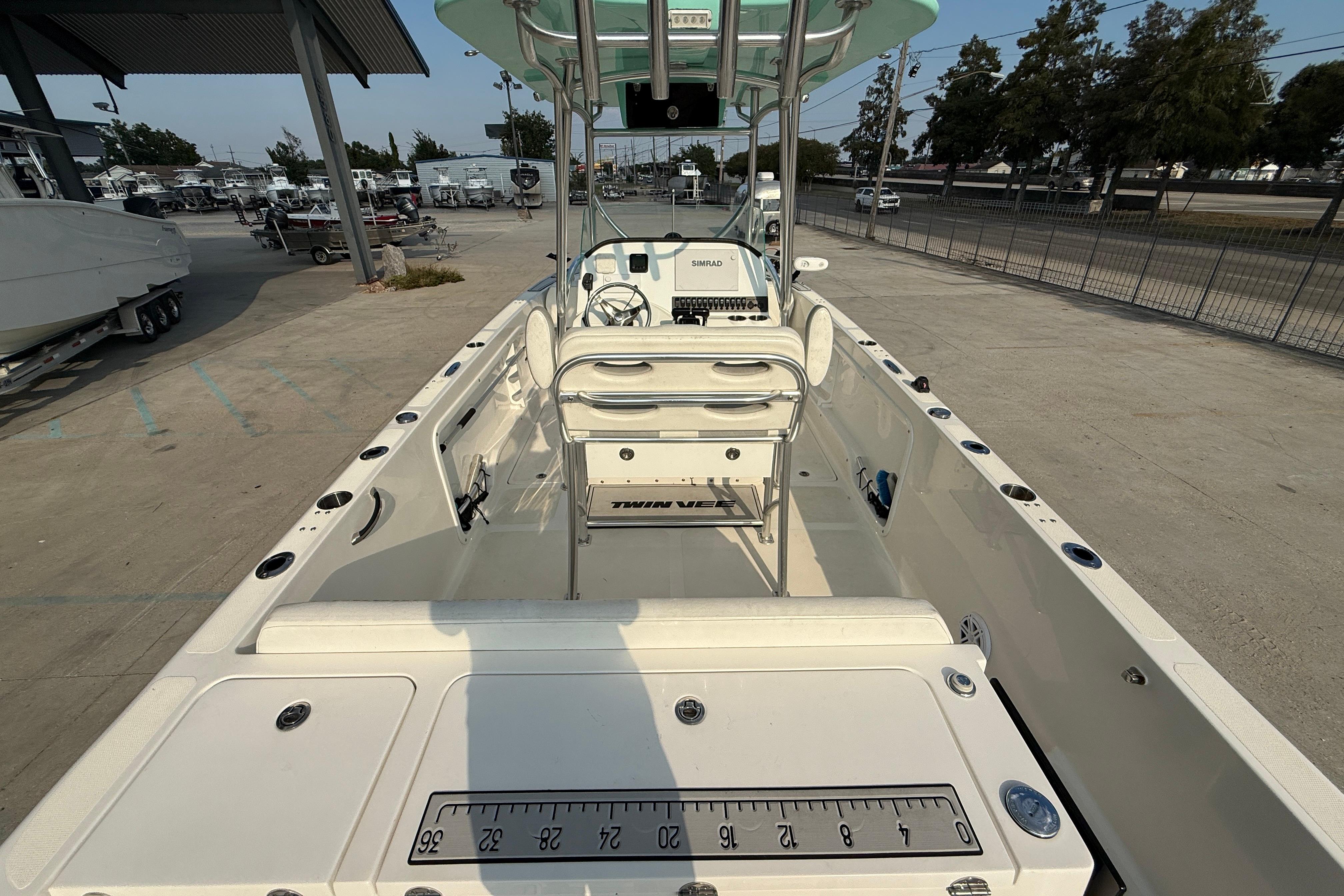 2020 Twin Vee 240 GFX CC boat interior with helm and seating area.