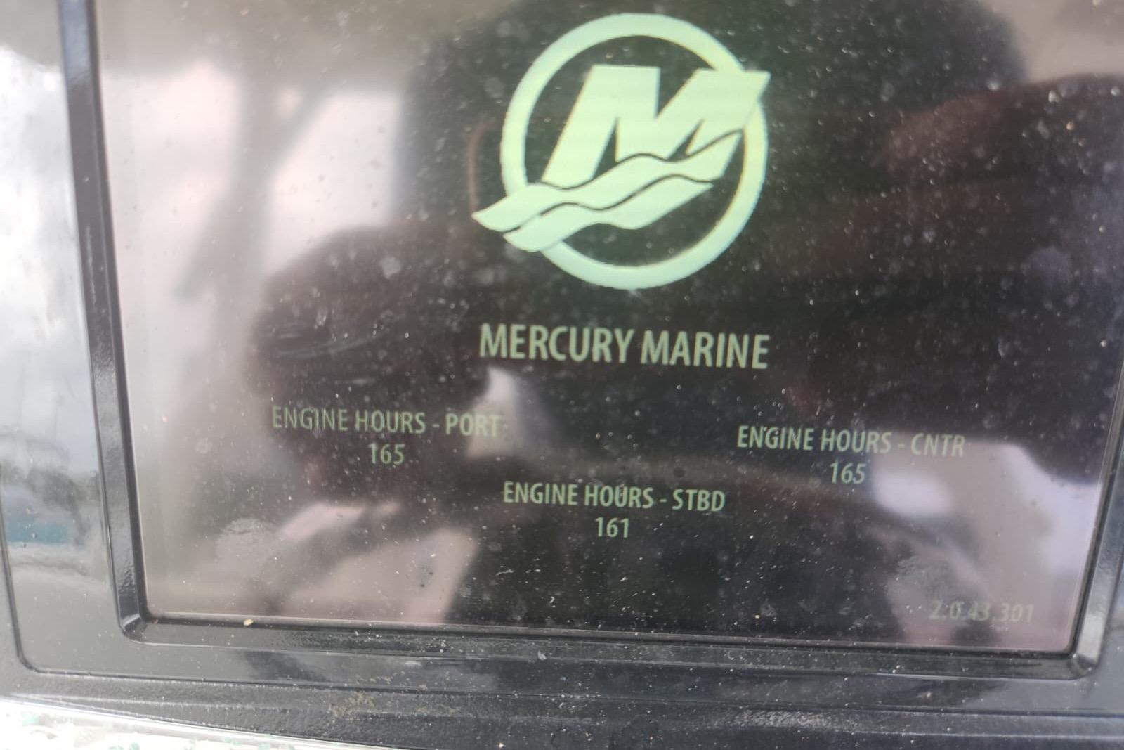 Display screen showing Mercury Marine engine hours for Boston Whaler 350 Outrage, 2014 model.