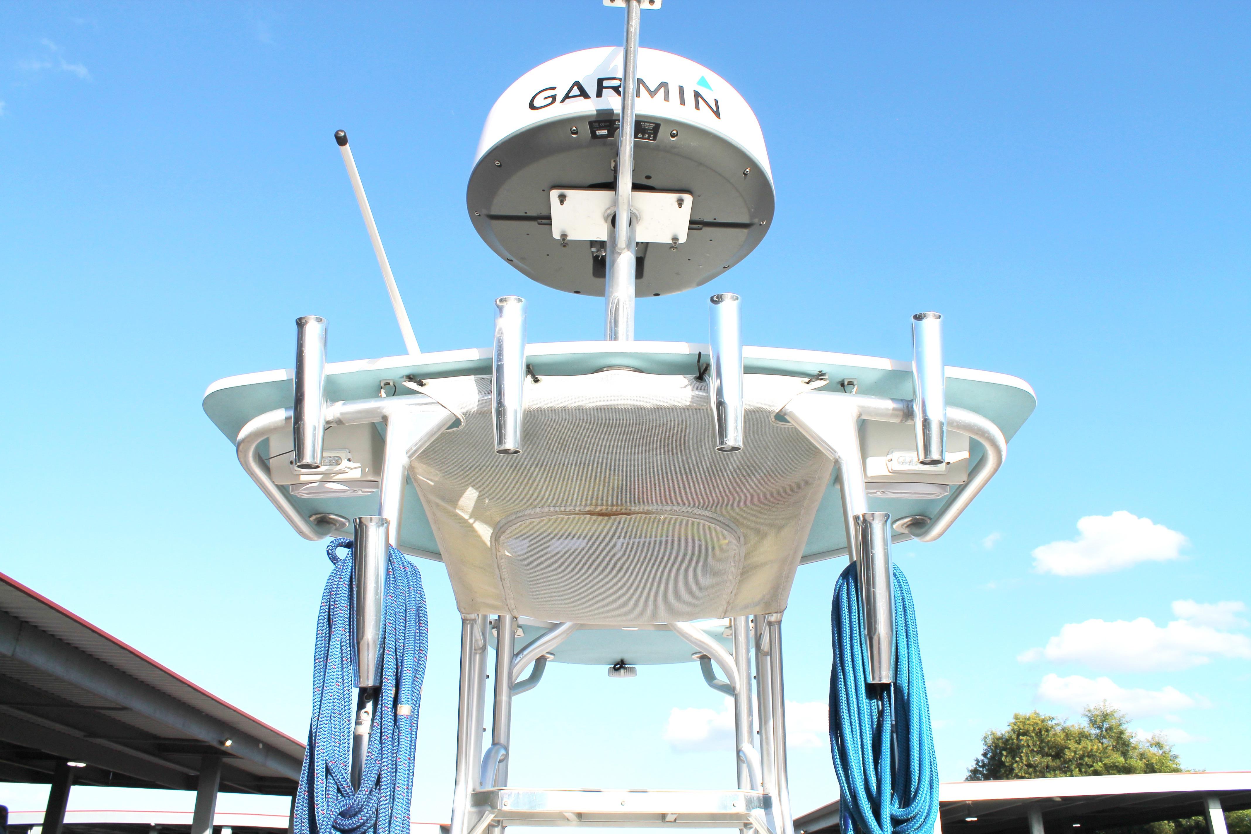 2018 Andros 26 Tarpon boat with Garmin radar, blue sky background.