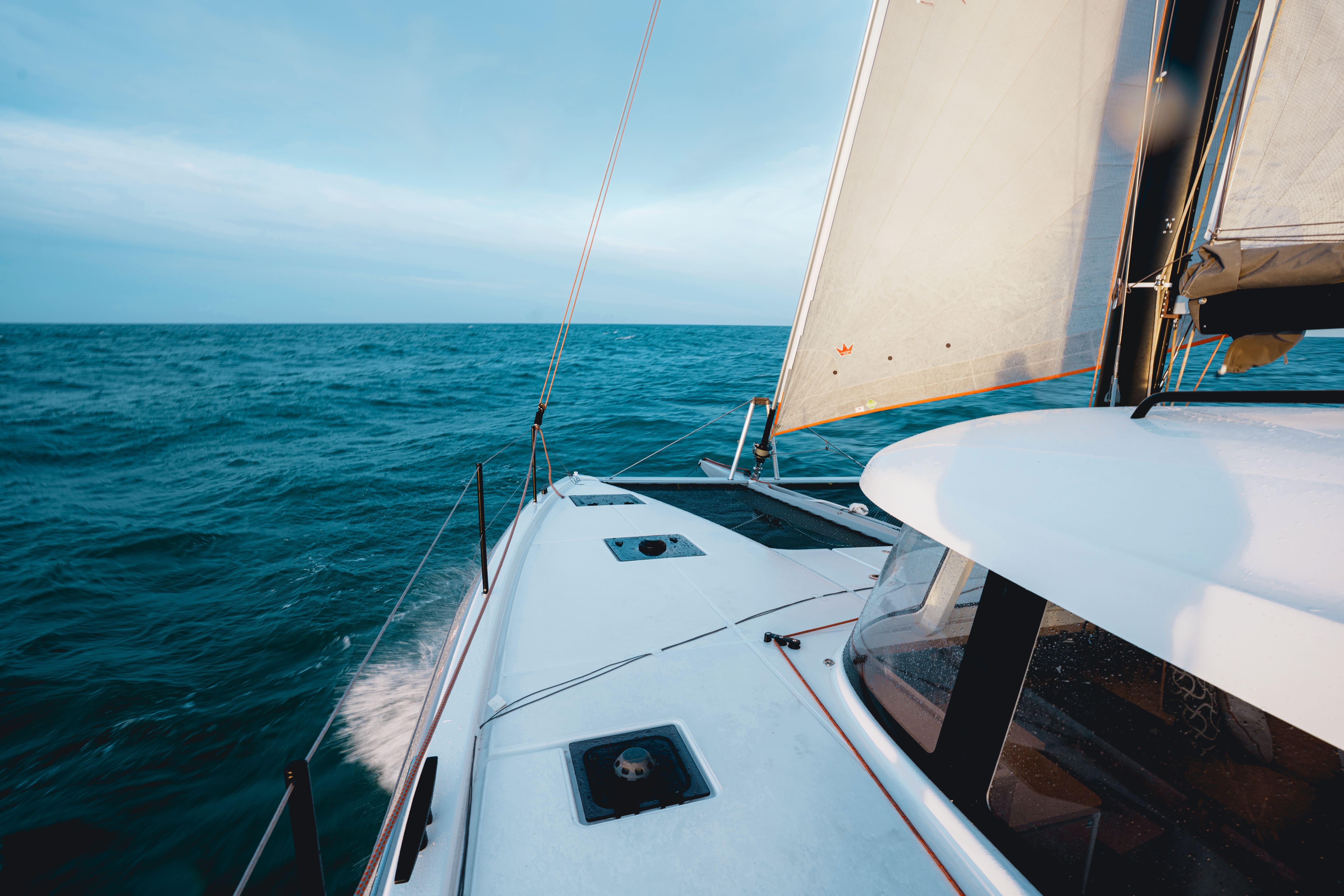 Sailing on the 2026 Excess 13 catamaran in open ocean waters.