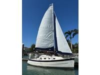 2018 Hake Seaward 26 RK sailboat on water.