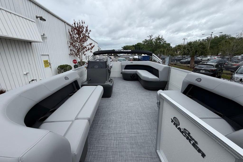 2026 Sun Tracker Party Barge 16 DLX pontoon boat with spacious seating and modern design.