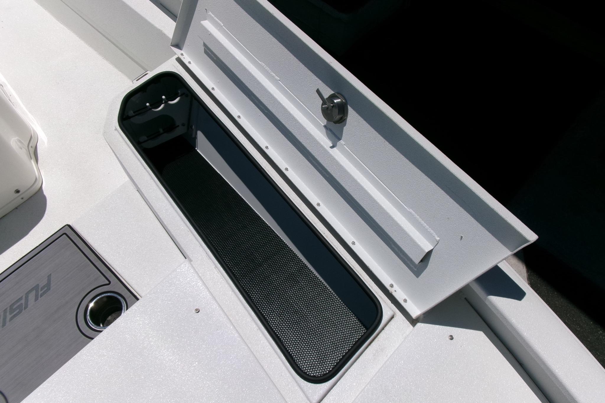 Open storage compartment on 2022 Avid 21 Fusion boat deck.