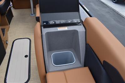2026 Princecraft Vouge 25 RL boat interior with built-in cooler and seating.