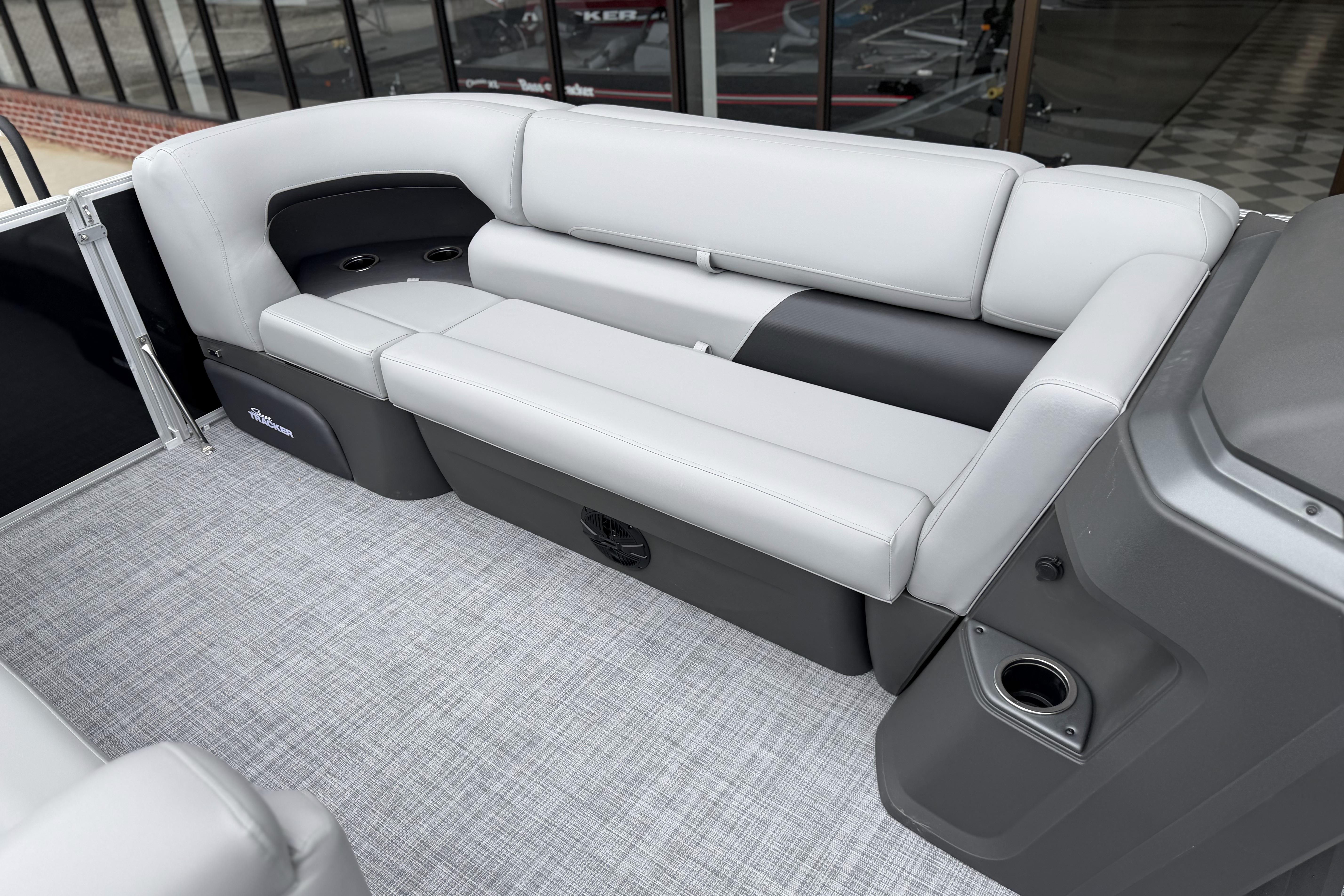 2026 Sun Tracker Party Barge 20 DLX interior with plush seating and modern design.
