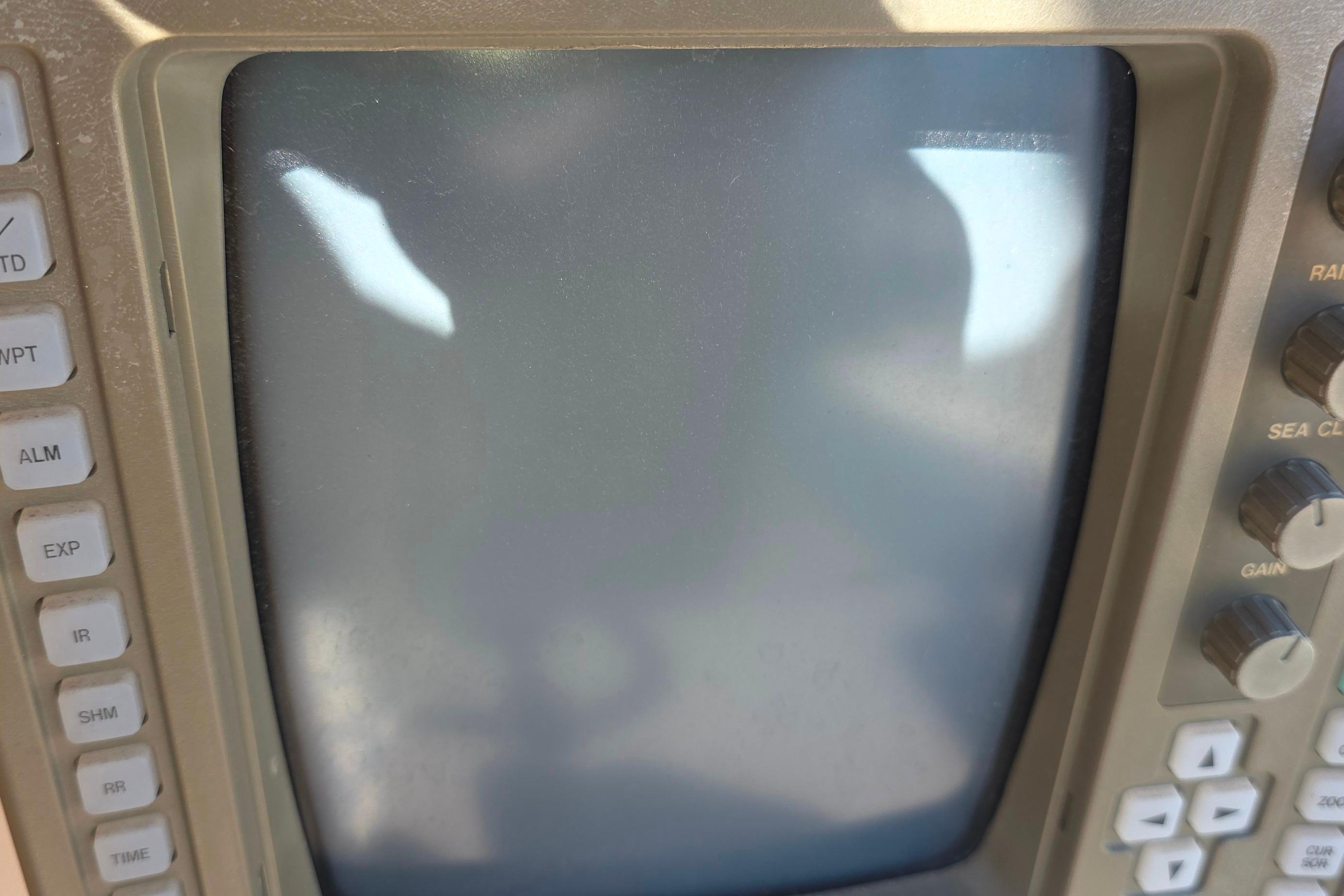 Close-up of a vintage radar display on a 1978 Islander Freeport 41 yacht.