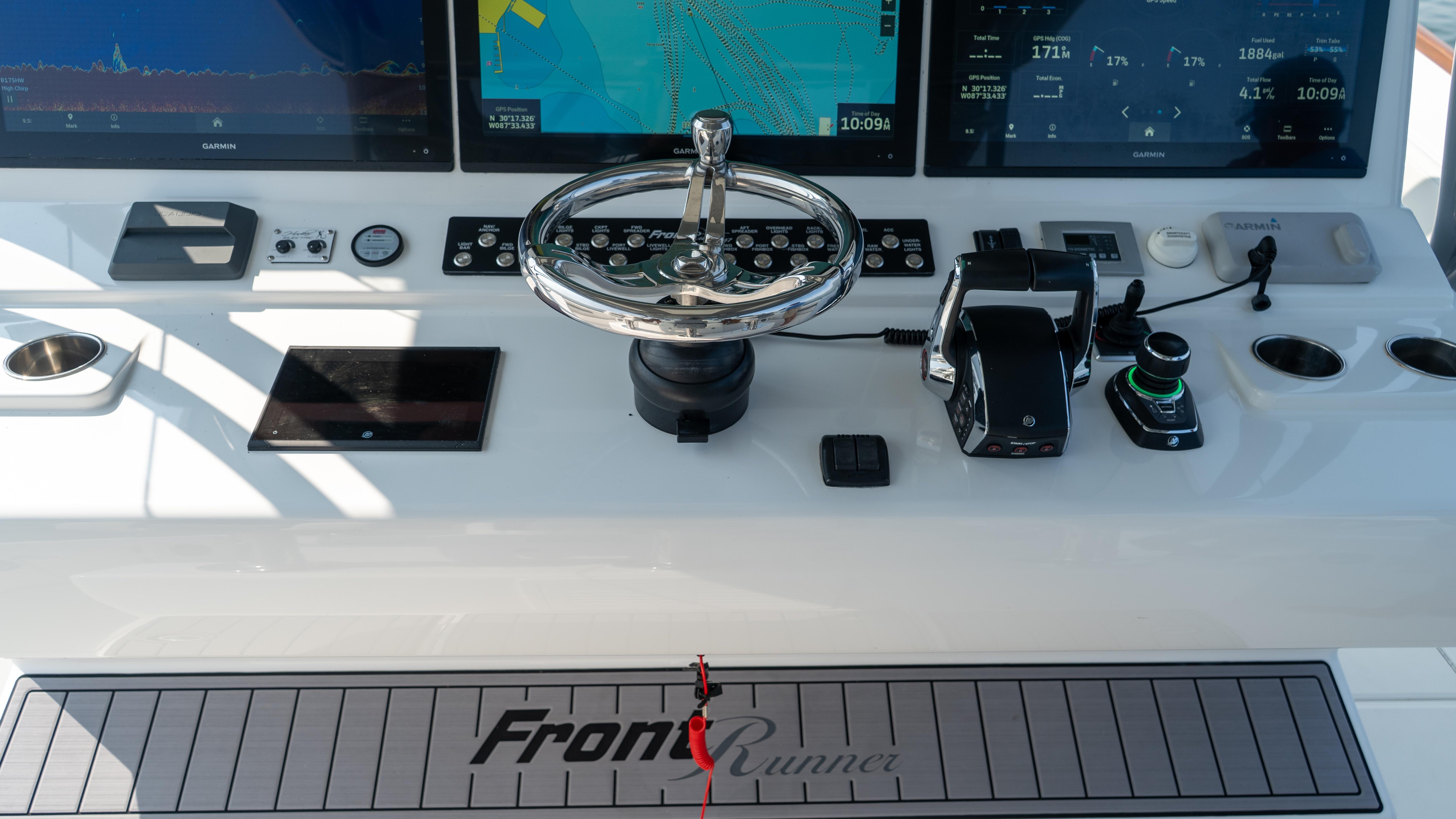 2023 Front Runner 47 Center Console dashboard with navigation screens and controls.