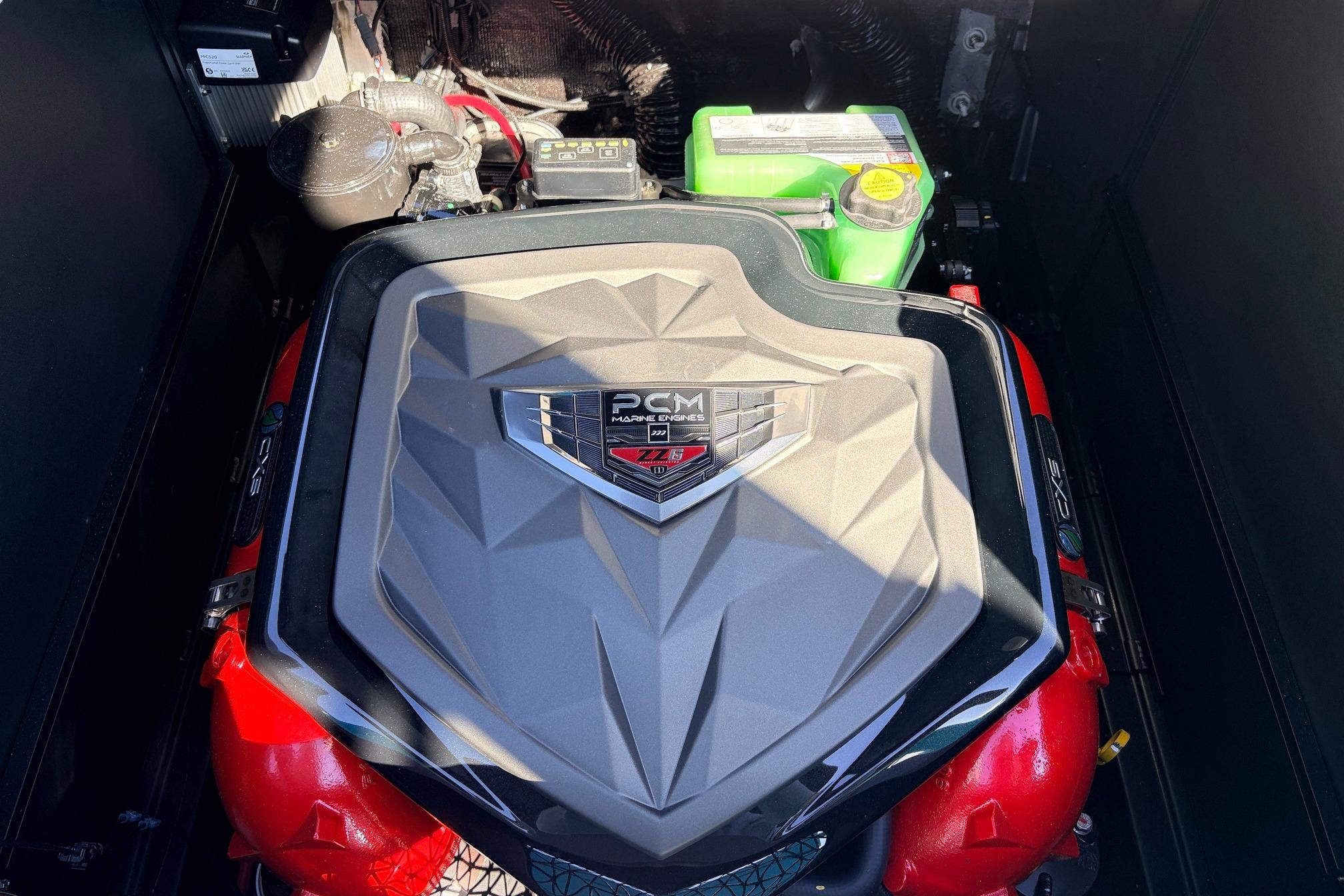 2026 Nautique Super Air Nautique G23 engine compartment with PCM engine cover.