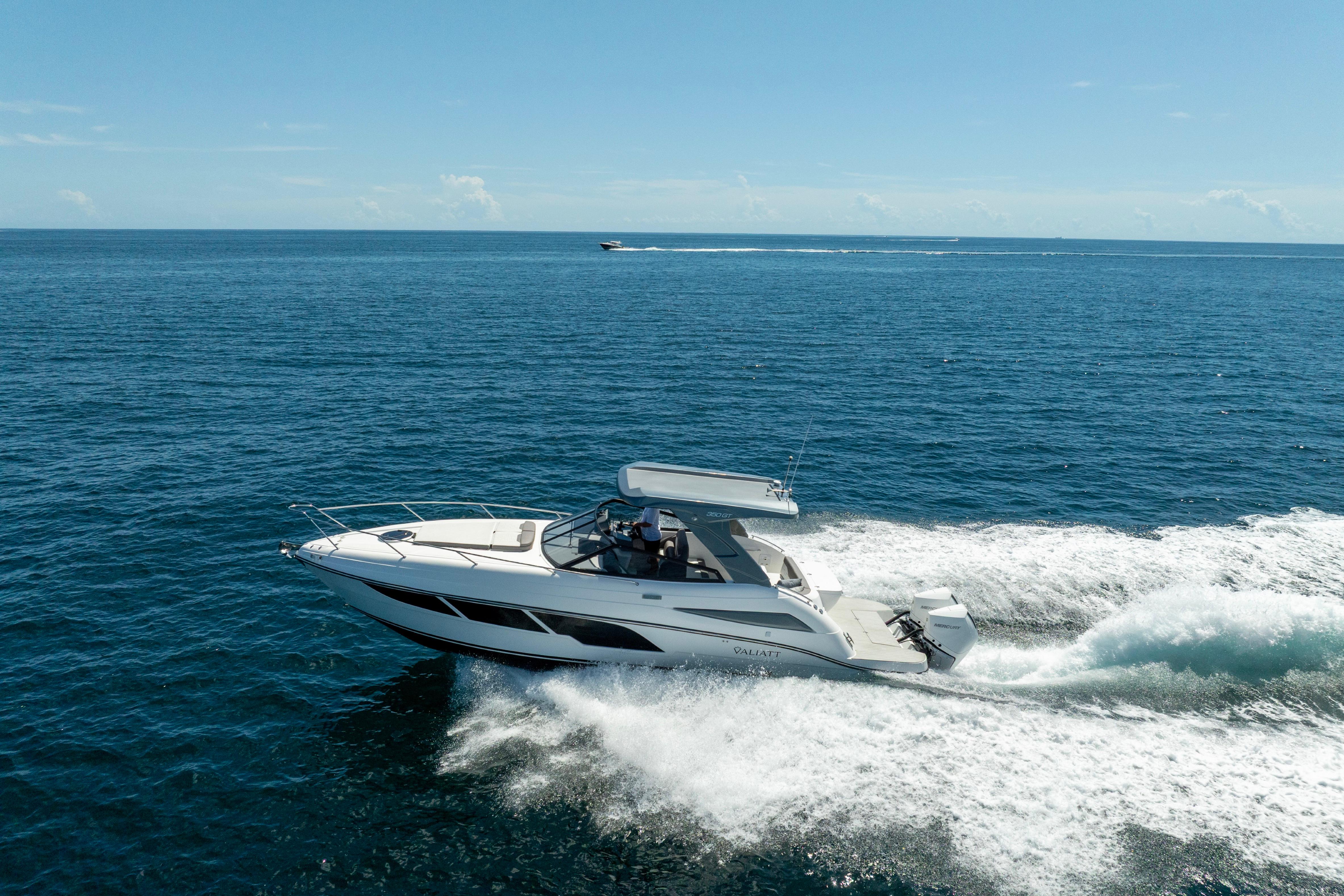 2025 Valiatt 350GT boat cruising on open ocean under clear blue sky.