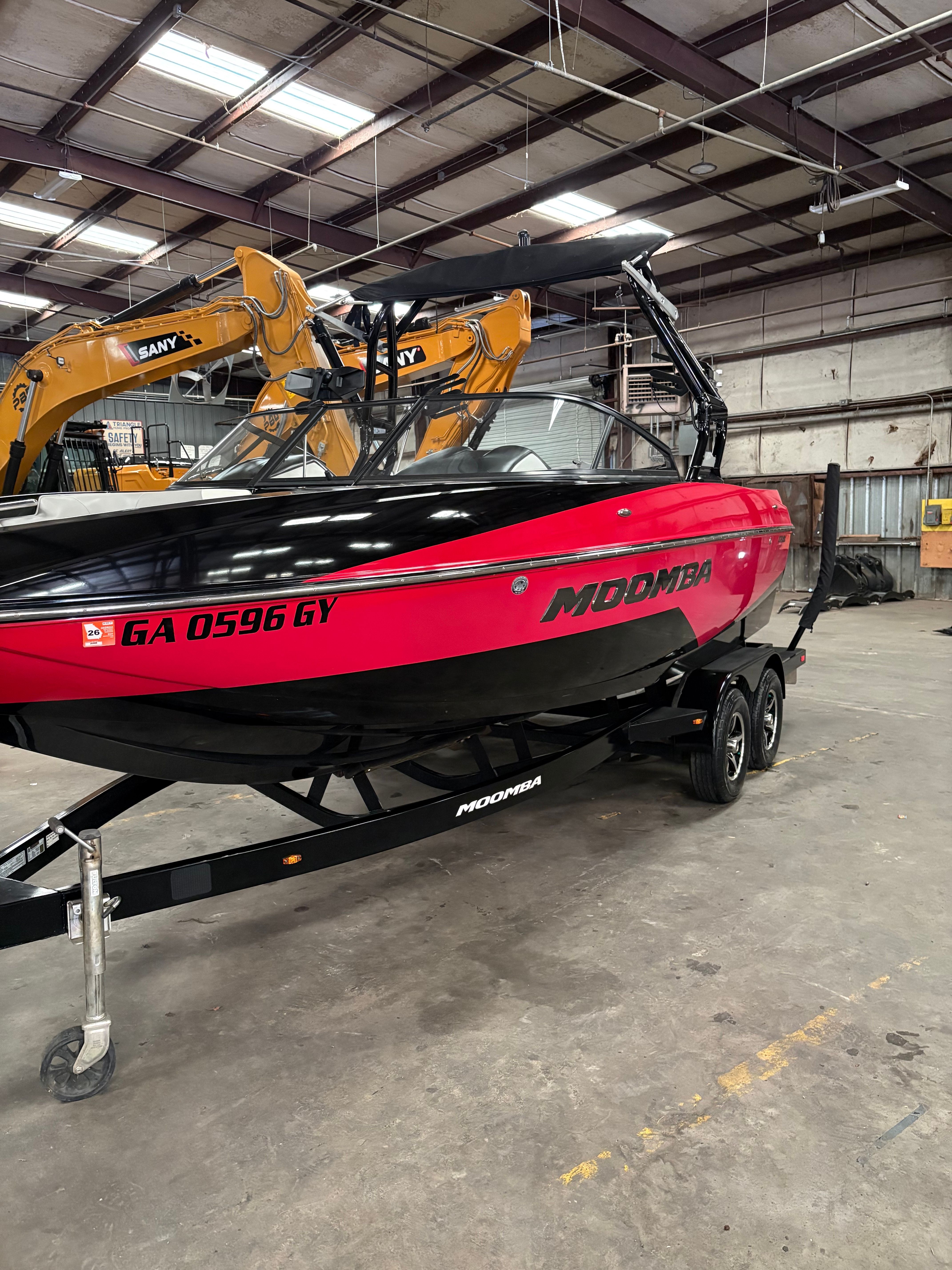 2019 Moomba Craz boat on trailer in warehouse.