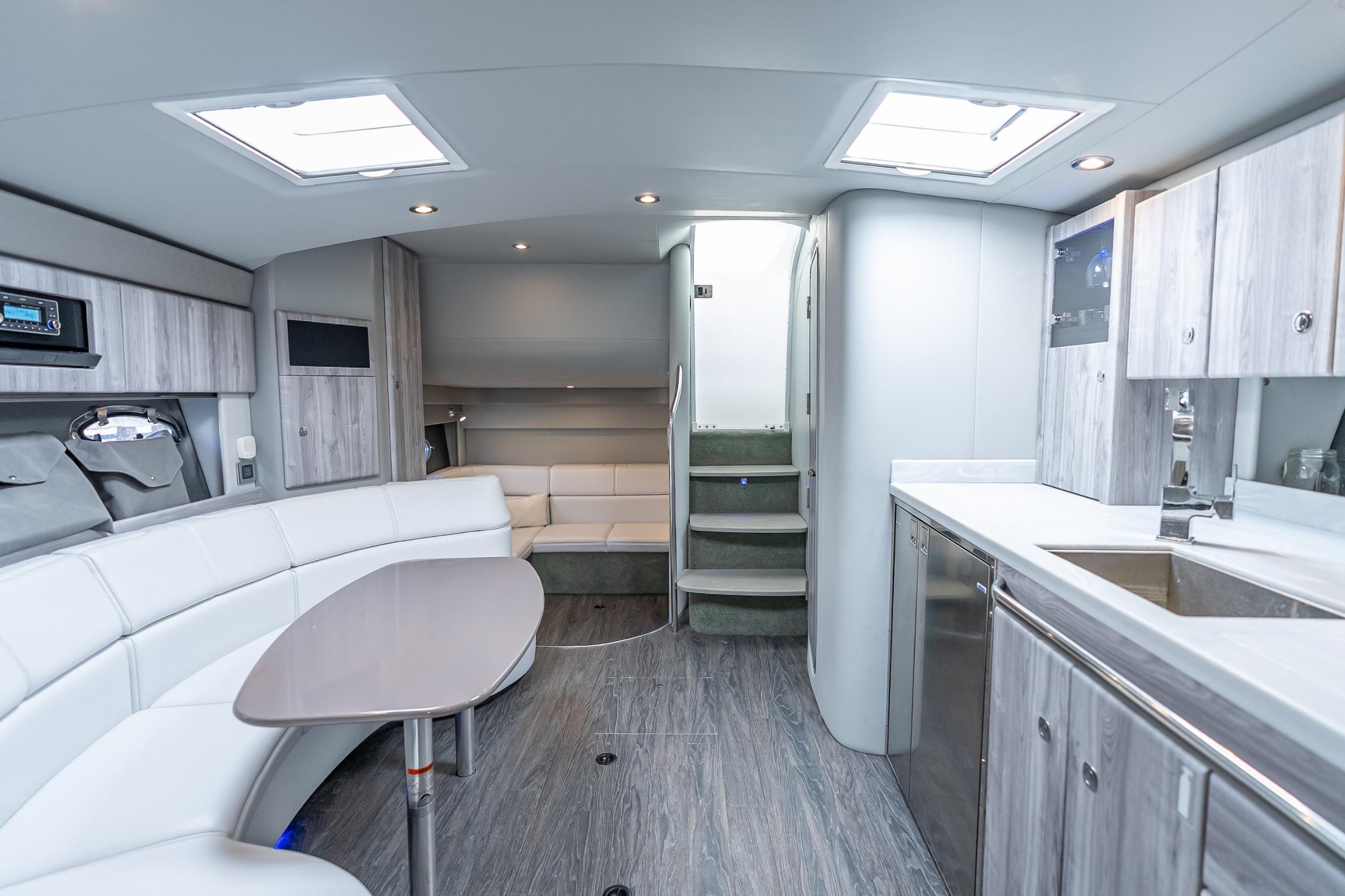 Luxurious interior of 2022 Formula 40 Performance Cruiser with modern kitchen and seating area.