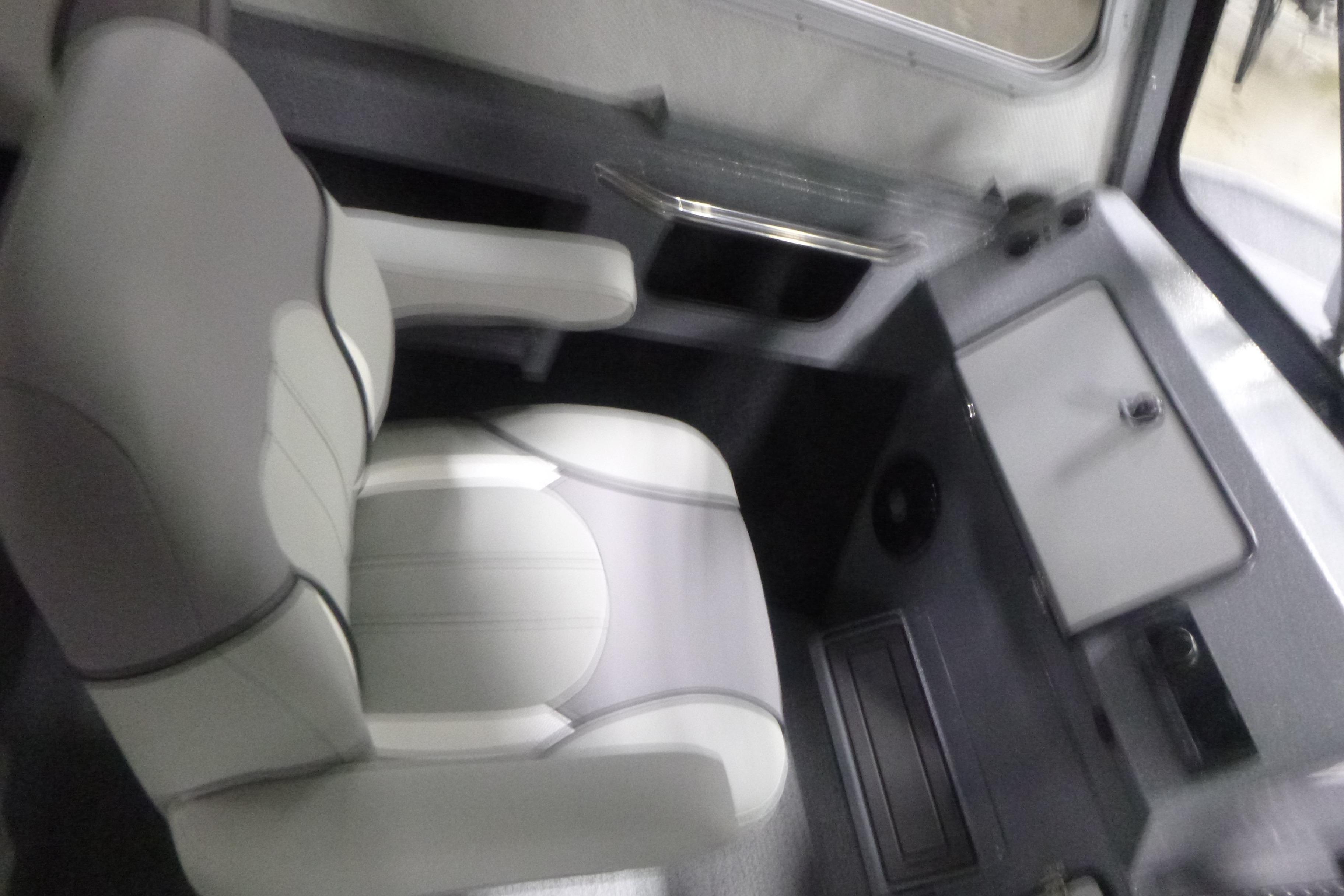 Interior of 2026 KingFisher 2425 Escape HT boat, featuring a sleek, modern seat design.