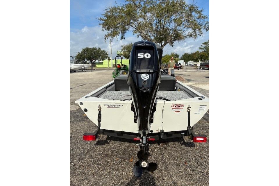 2026 Tracker Pro 170 boat with Mercury 50 outboard motor, parked outdoors.