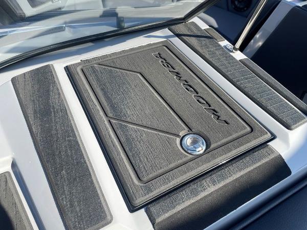 2025 Moomba Mondo boat deck with textured surface and logo.