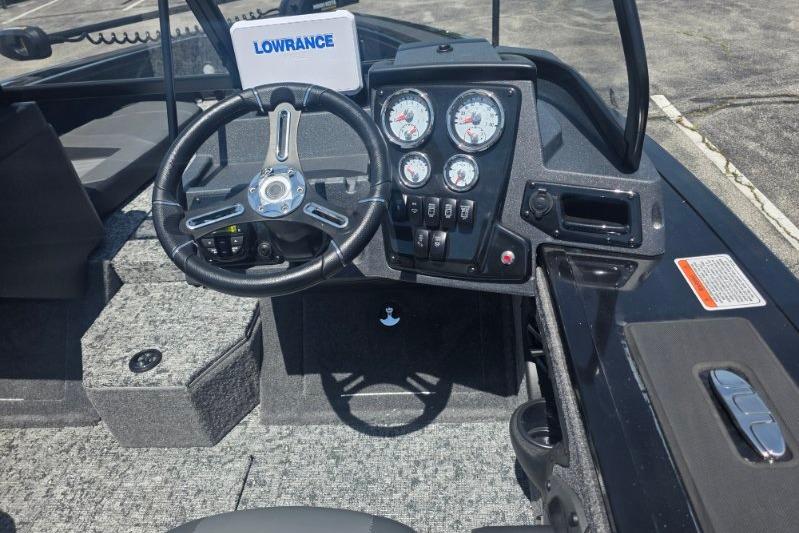 2026 Tracker Targa V-18 Combo boat dashboard with steering wheel and gauges.