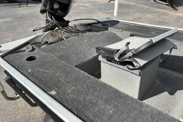2015 Tracker Panfish 16 boat interior with motor and storage compartment.