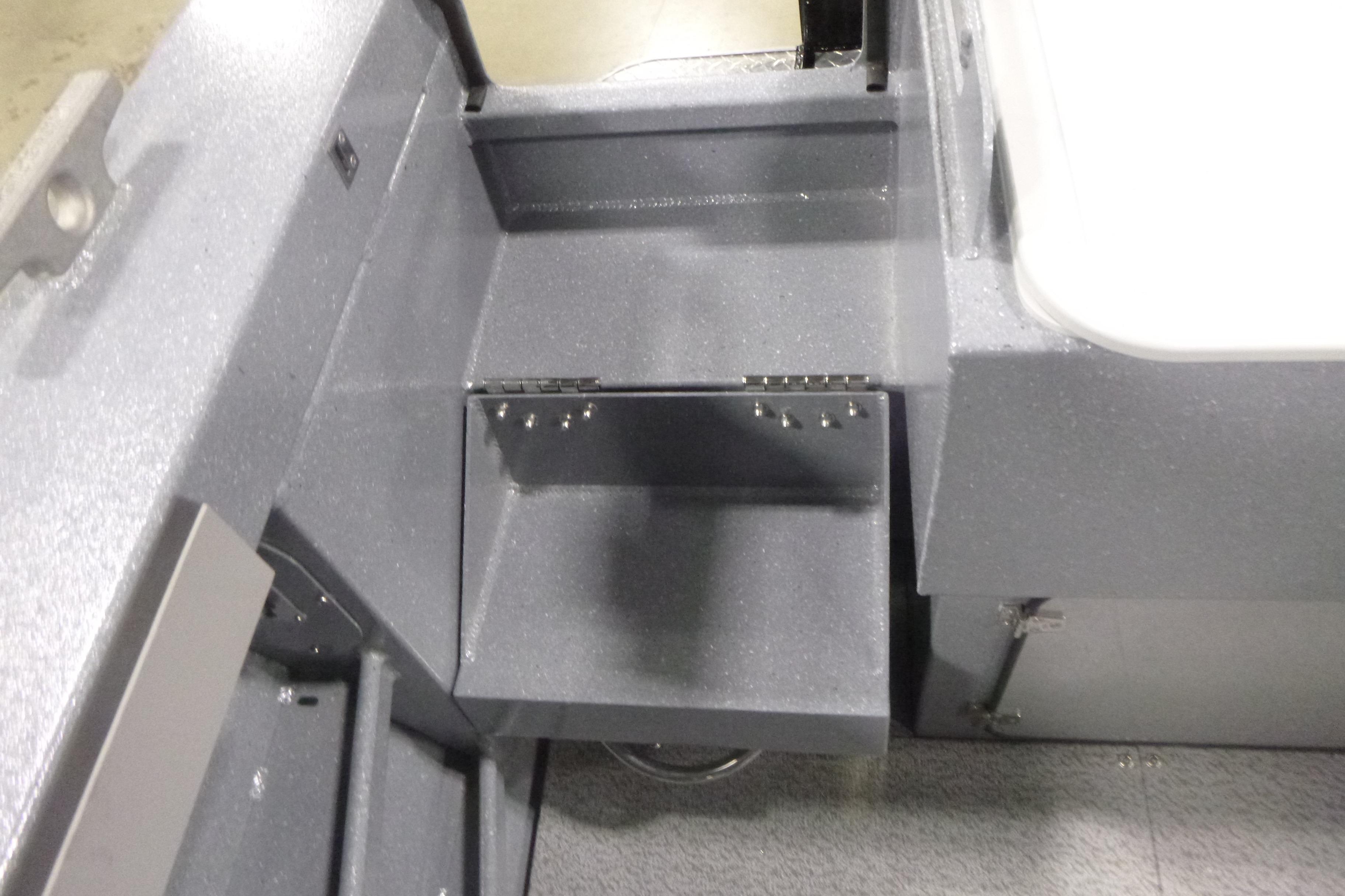 Interior detail of 2026 KingFisher 2425 Escape HT boat, featuring a gray step.