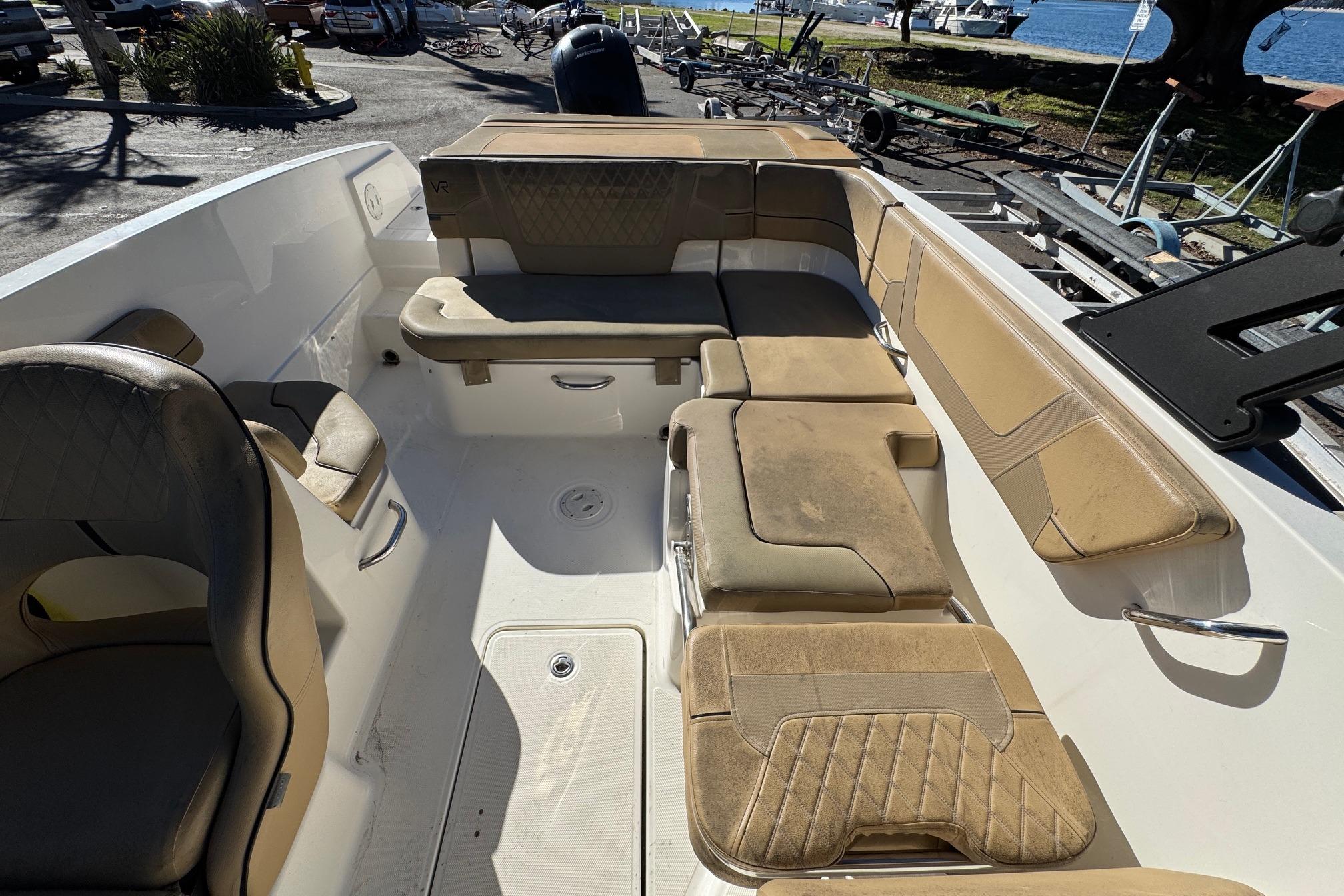 2022 Bayliner VR6 Bowrider OB interior with tan seating and spacious layout.