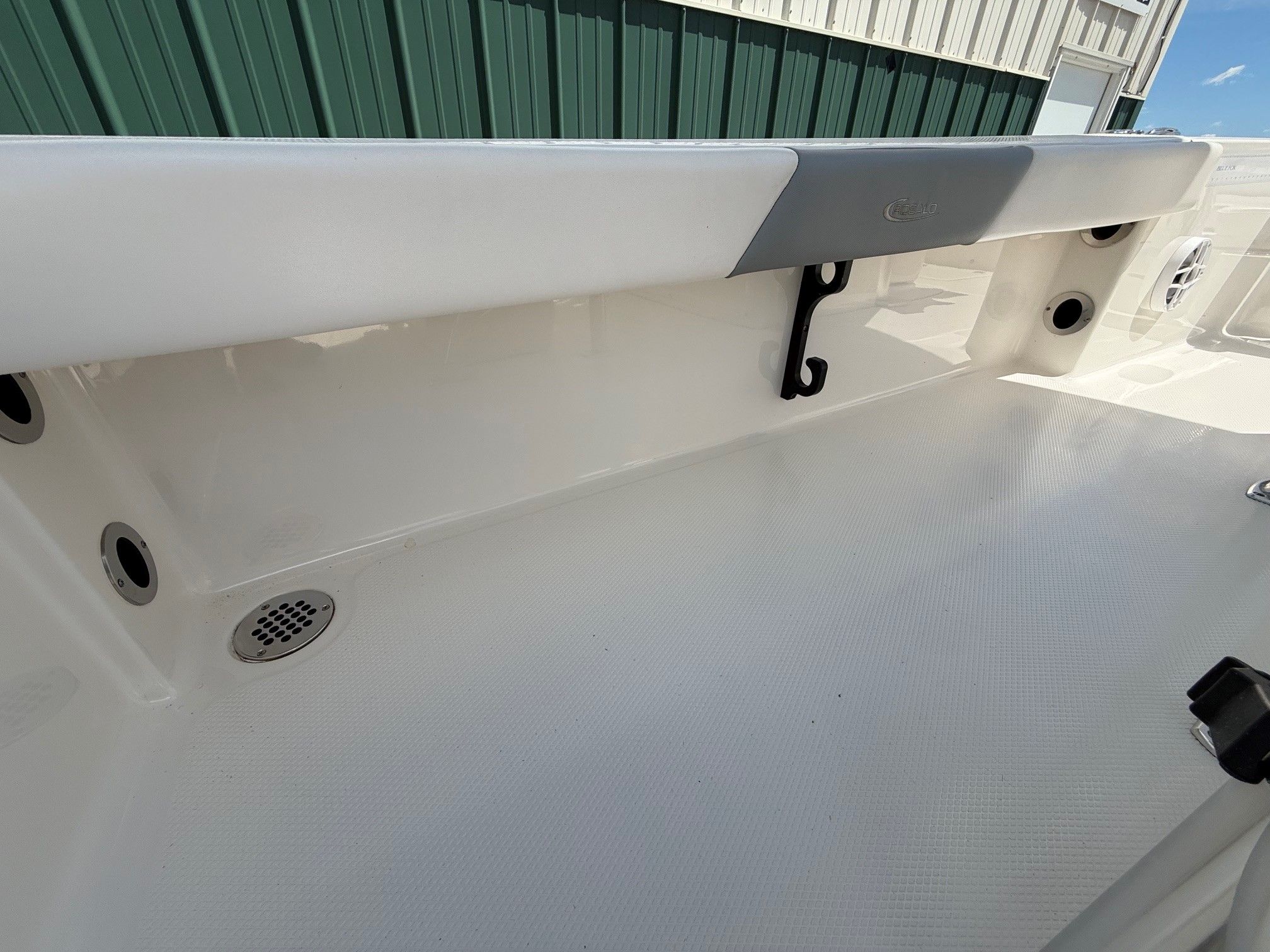 Interior view of a 2021 Robalo 226 Cayman boat deck.