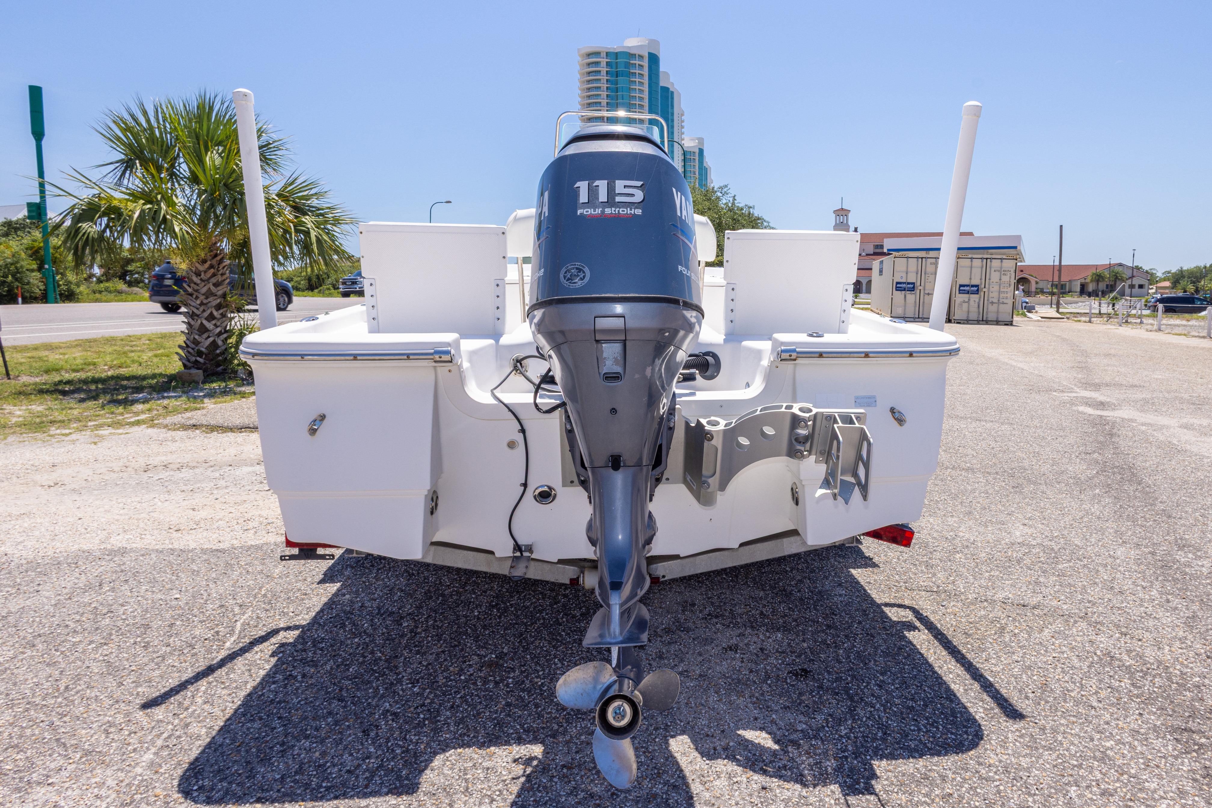 Rear view of a 2011 Sea Fox 200XT boat with a 115 horsepower outboard motor.