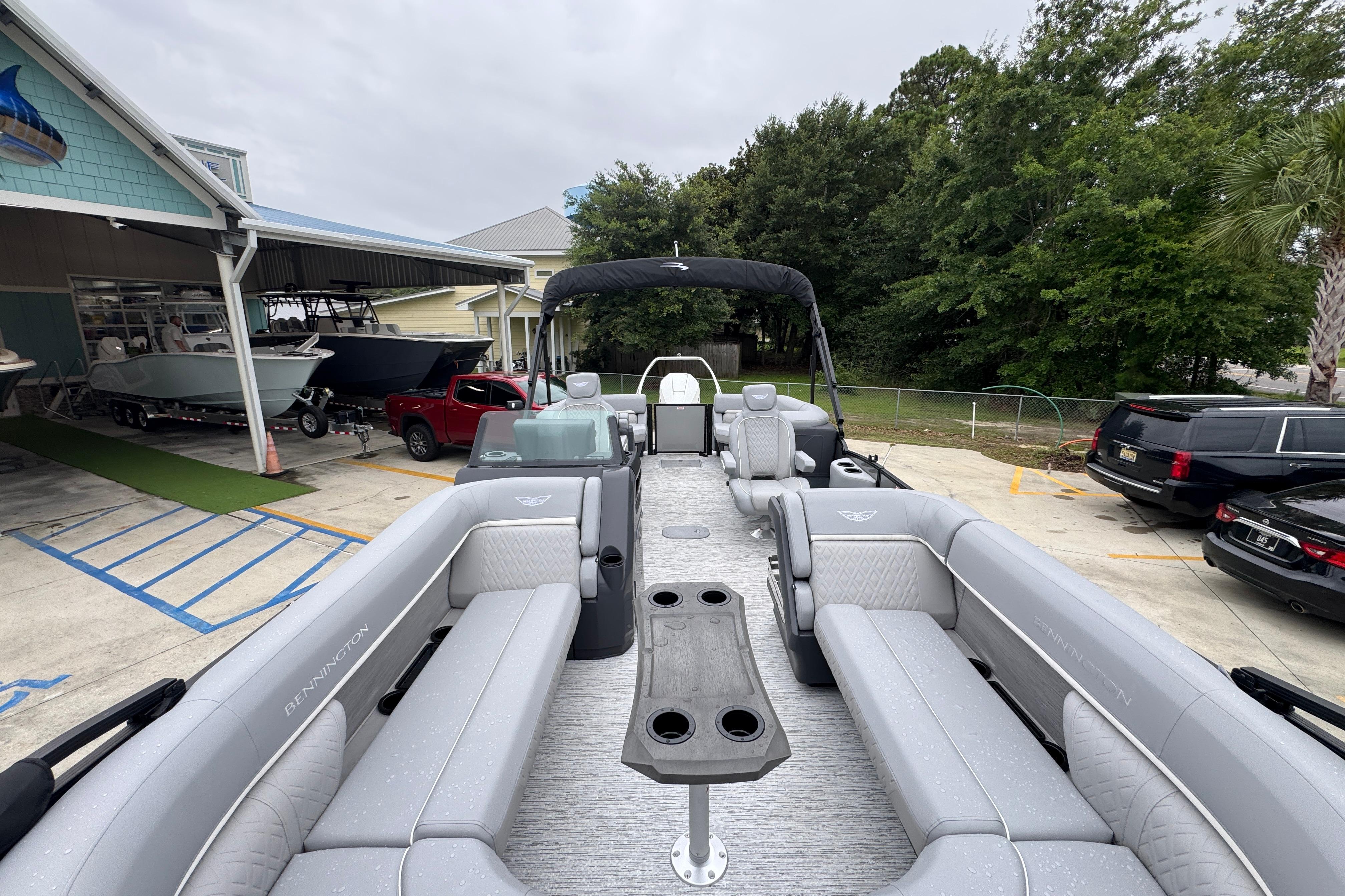 2027 Bennington 24 MFB pontoon boat with spacious seating and sleek design.
