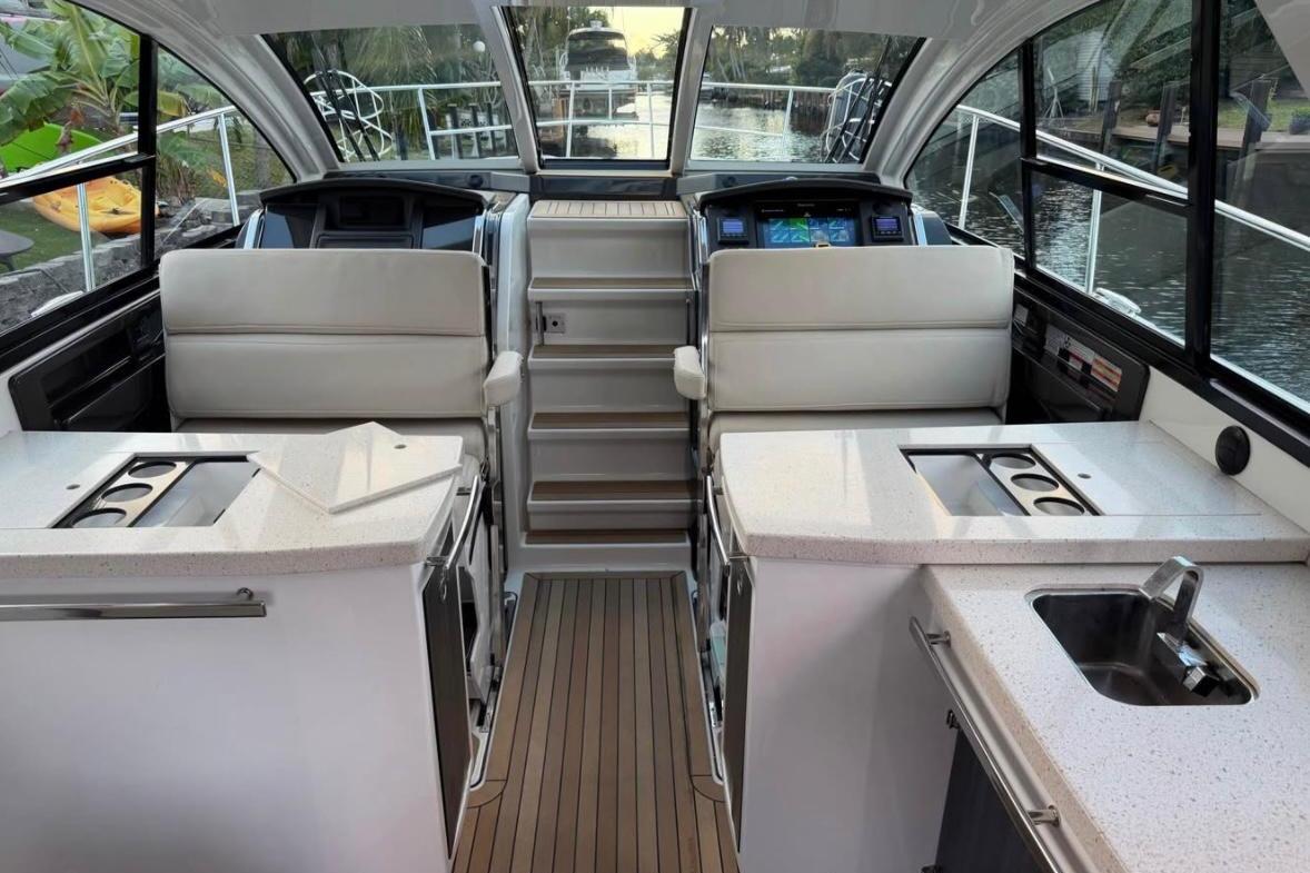 Interior of a 2015 Monterey 360 Sport Coupe yacht with modern amenities.