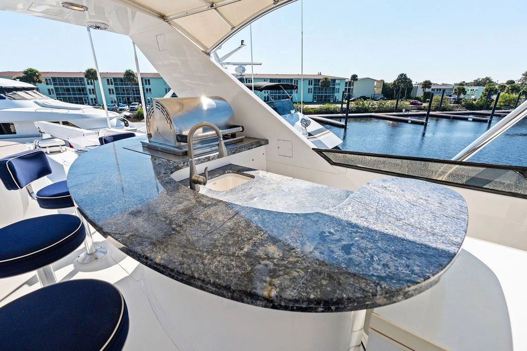 Luxurious Westport 112 yacht with sleek outdoor kitchen, built in 1999.