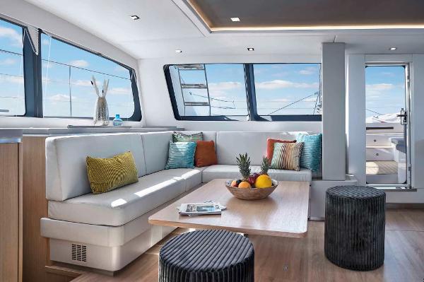 Luxurious interior of 2025 Privilege Signature 580 yacht with modern seating and decor.