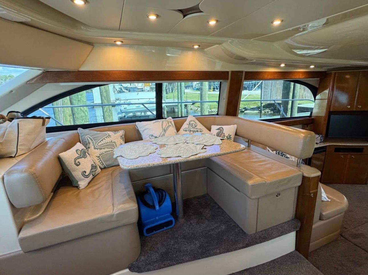 Interior of a 2007 Meridian 411 Sedan yacht with cozy seating area.