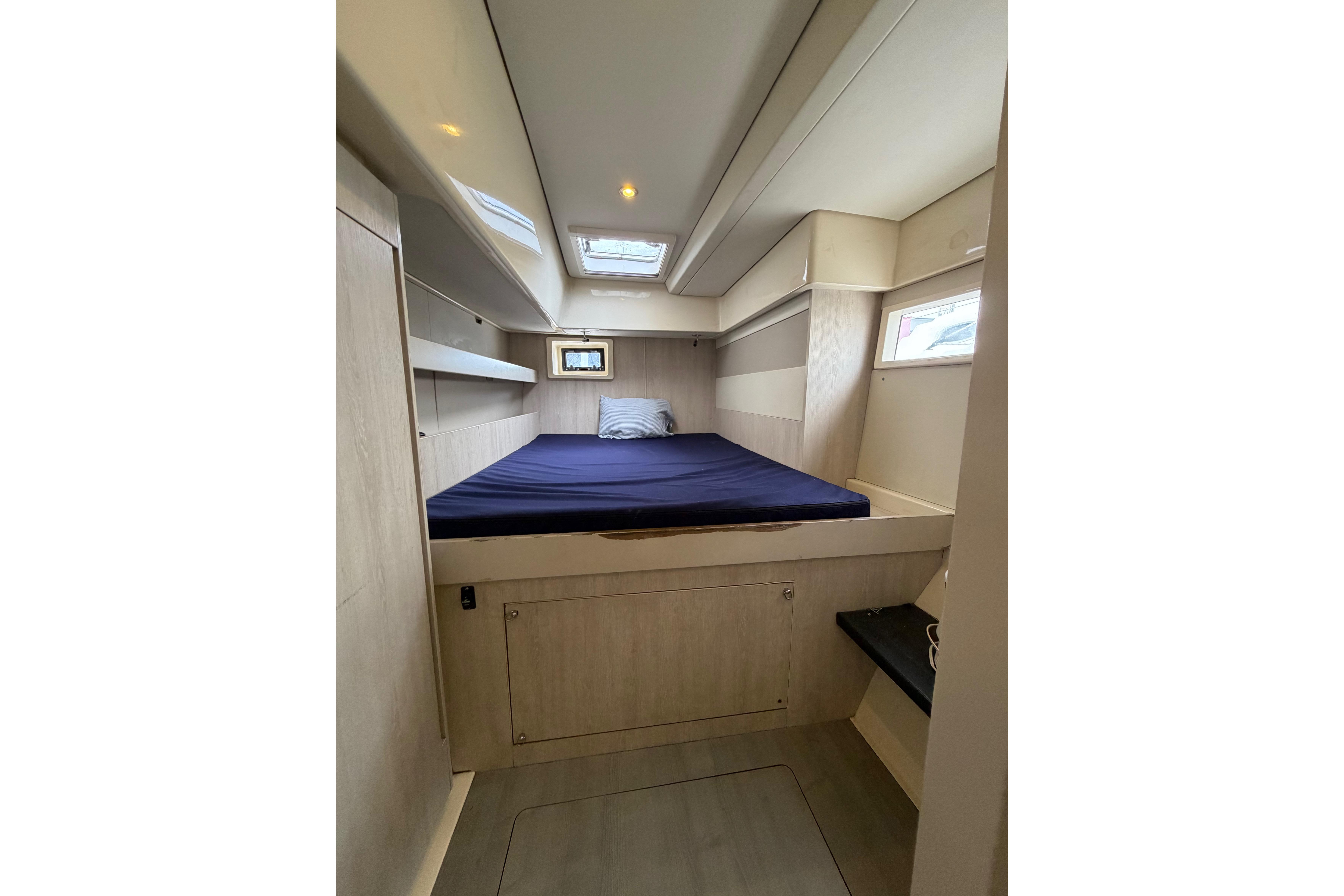 Cabin interior of 2015 Leopard 51 Powercat with bed and skylight.