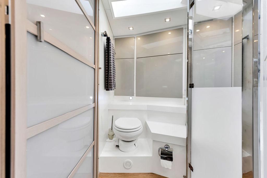 Luxurious bathroom in 2012 Fairline Targa 58 yacht with modern fixtures and sleek design.