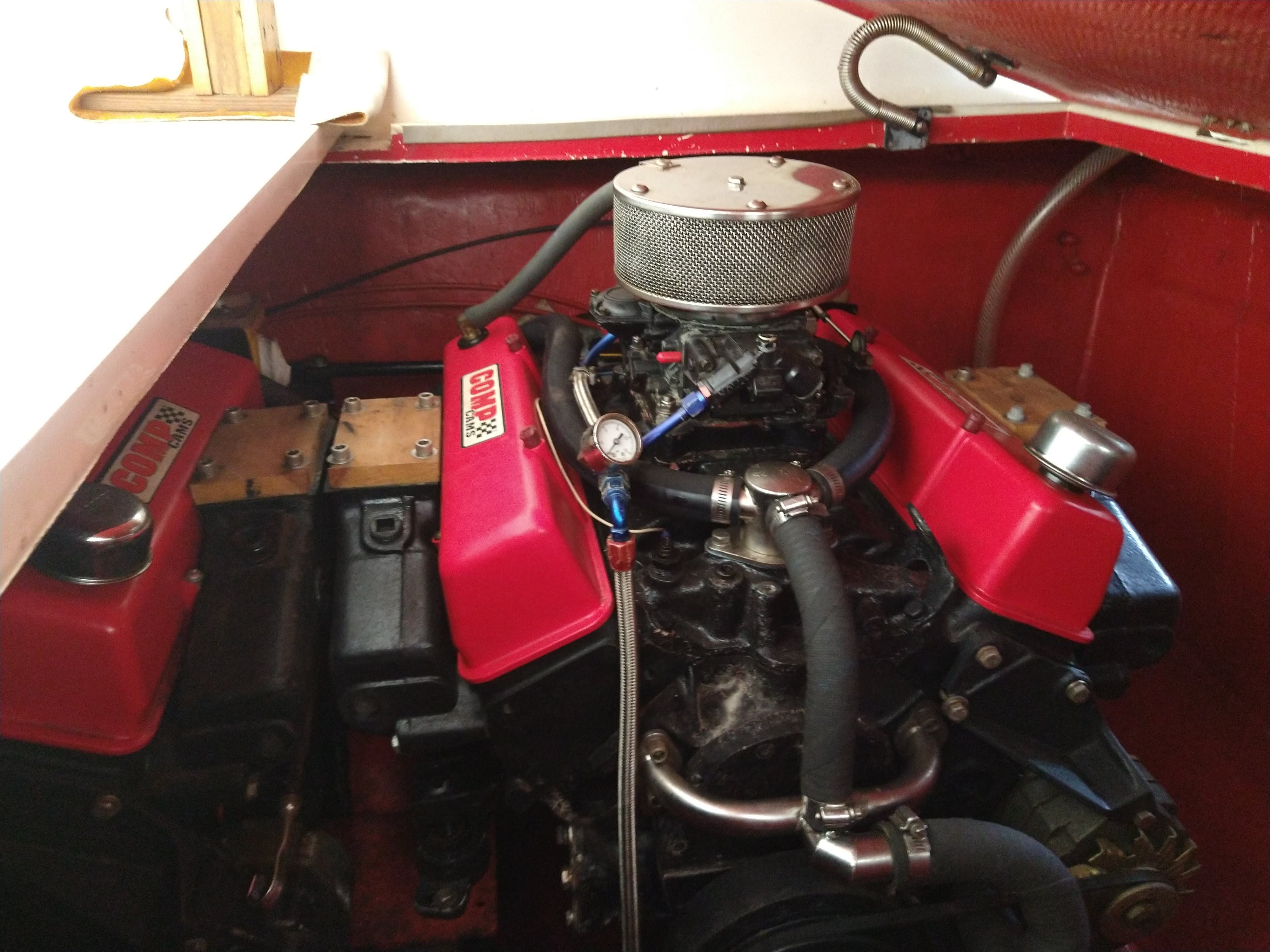 1986 Corsa Performance Boat engine with red valve covers.