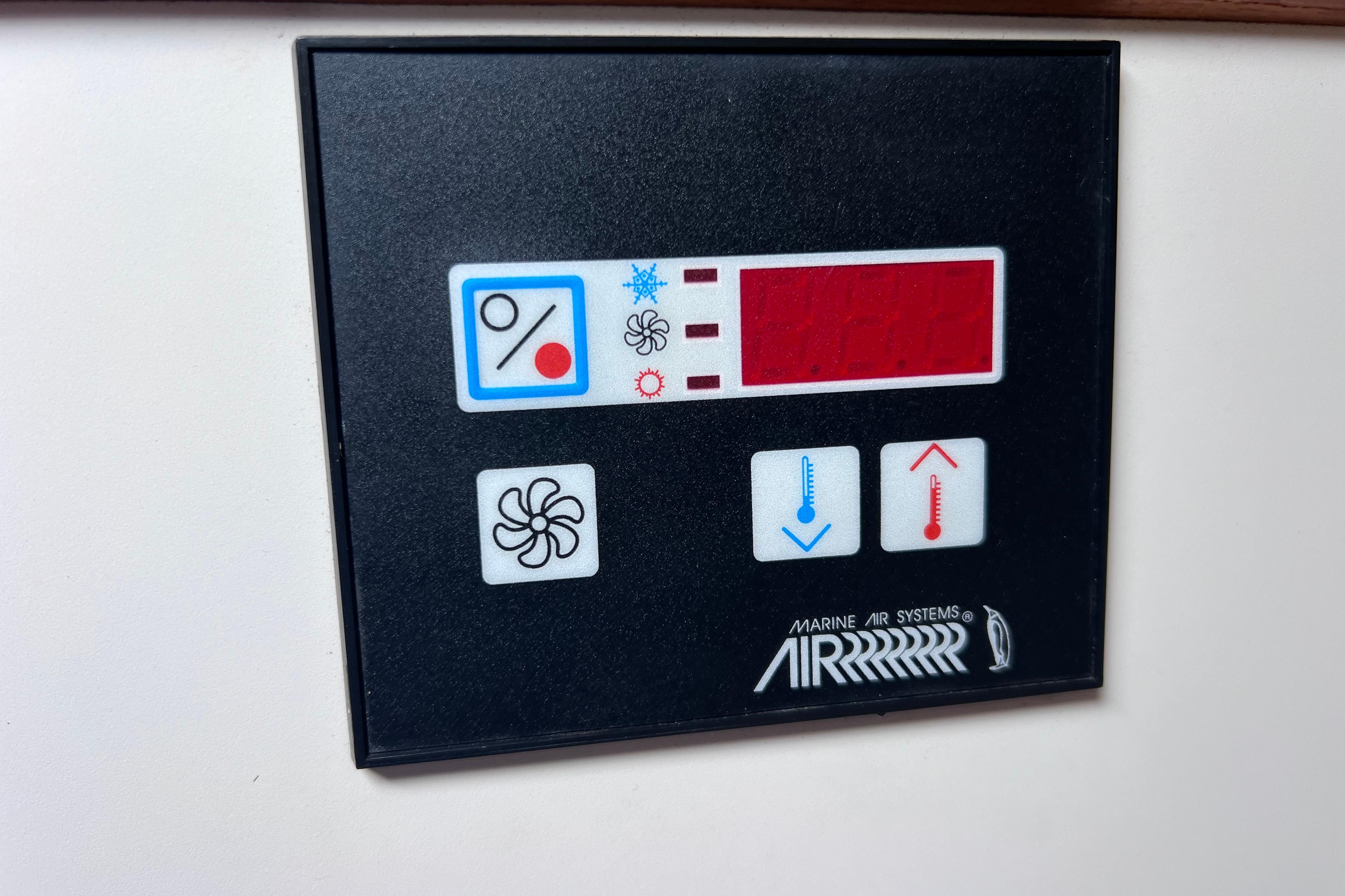 Control panel of a 2005 Pursuit 3070 Offshore boat's Marine Air Systems.