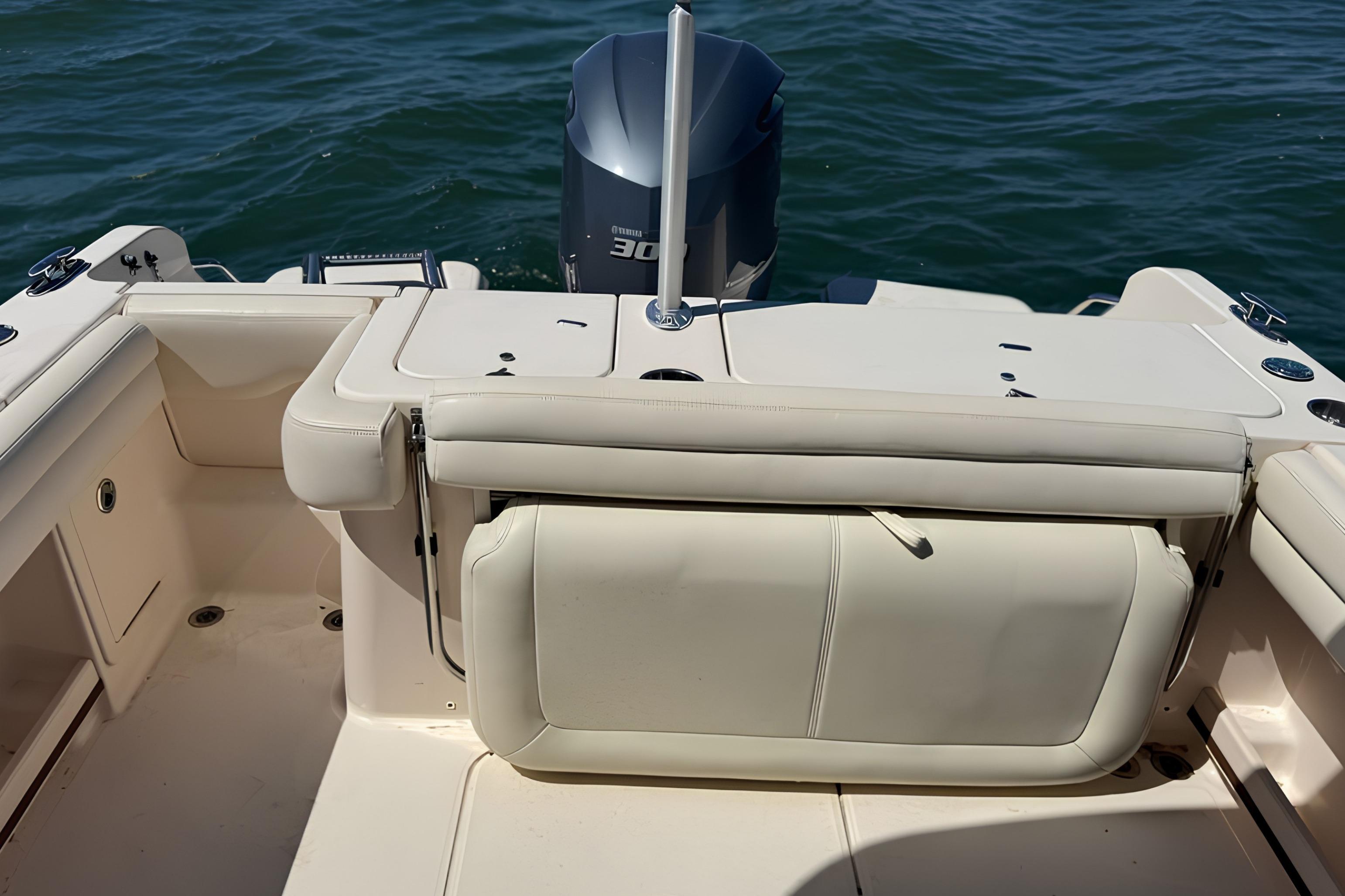 2017 Grady-White Freedom 235 boat interior with Yamaha 300 engine on water.