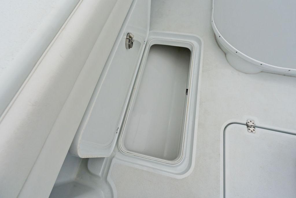 Open storage compartment on 2021 Yellowfin 36 Offshore boat deck.