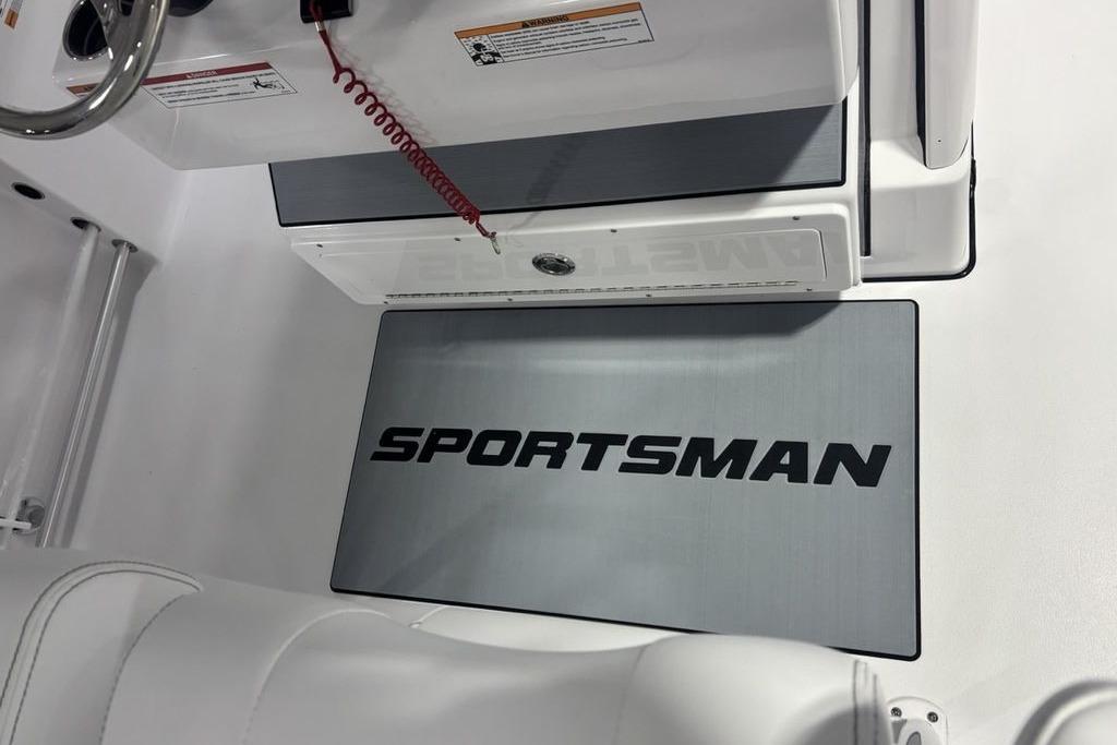 2026 Sportsman Open 252 Center Console interior with branded mat and console details.