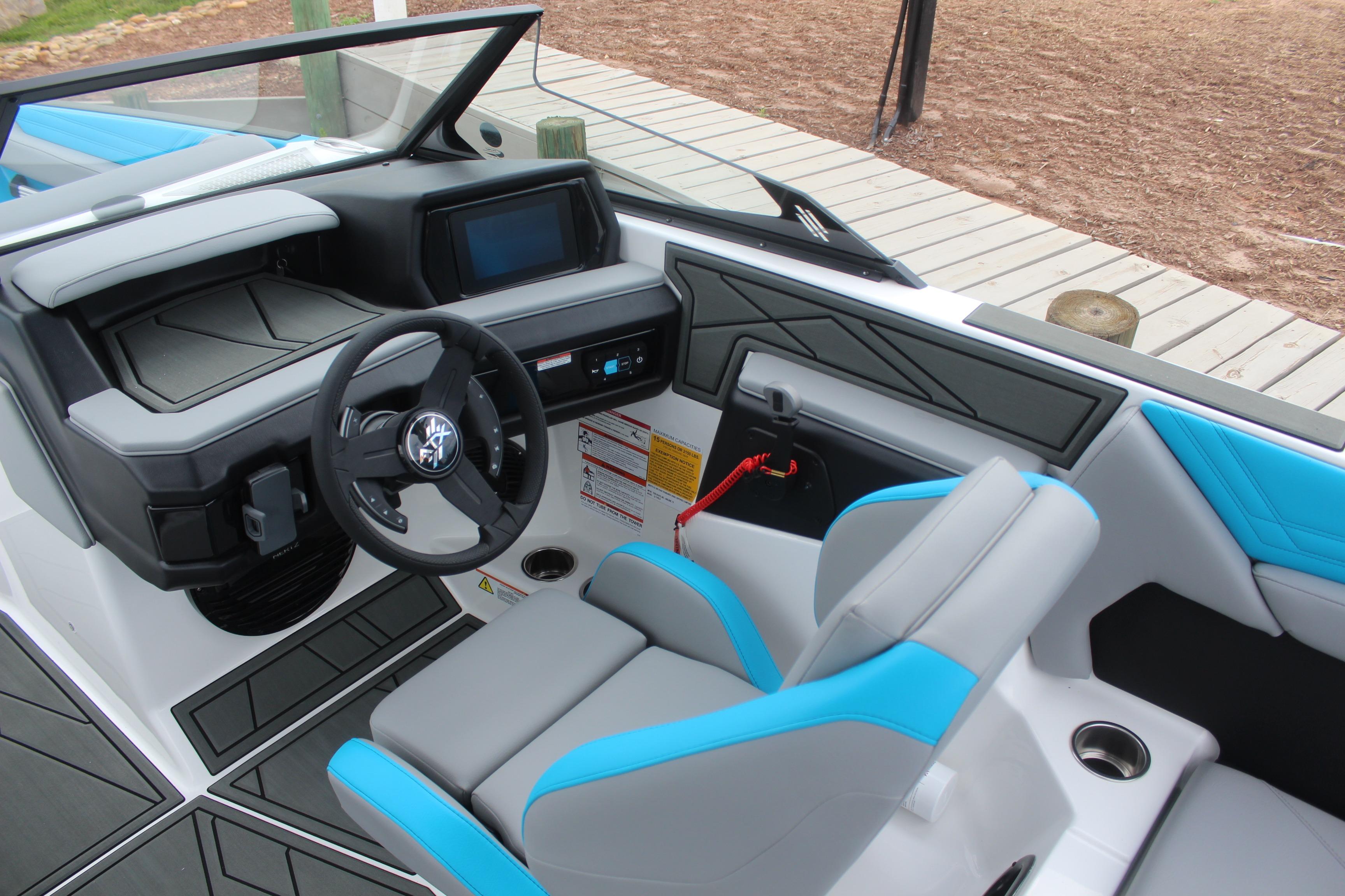 Interior of 2026 ATX Surf Boats 22 Type-S, featuring modern dashboard and seating.