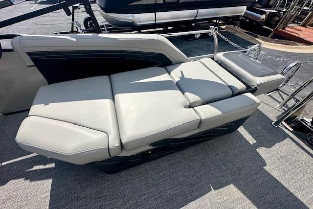 2026 Barletta C22M boat with luxurious reclining seats on deck.