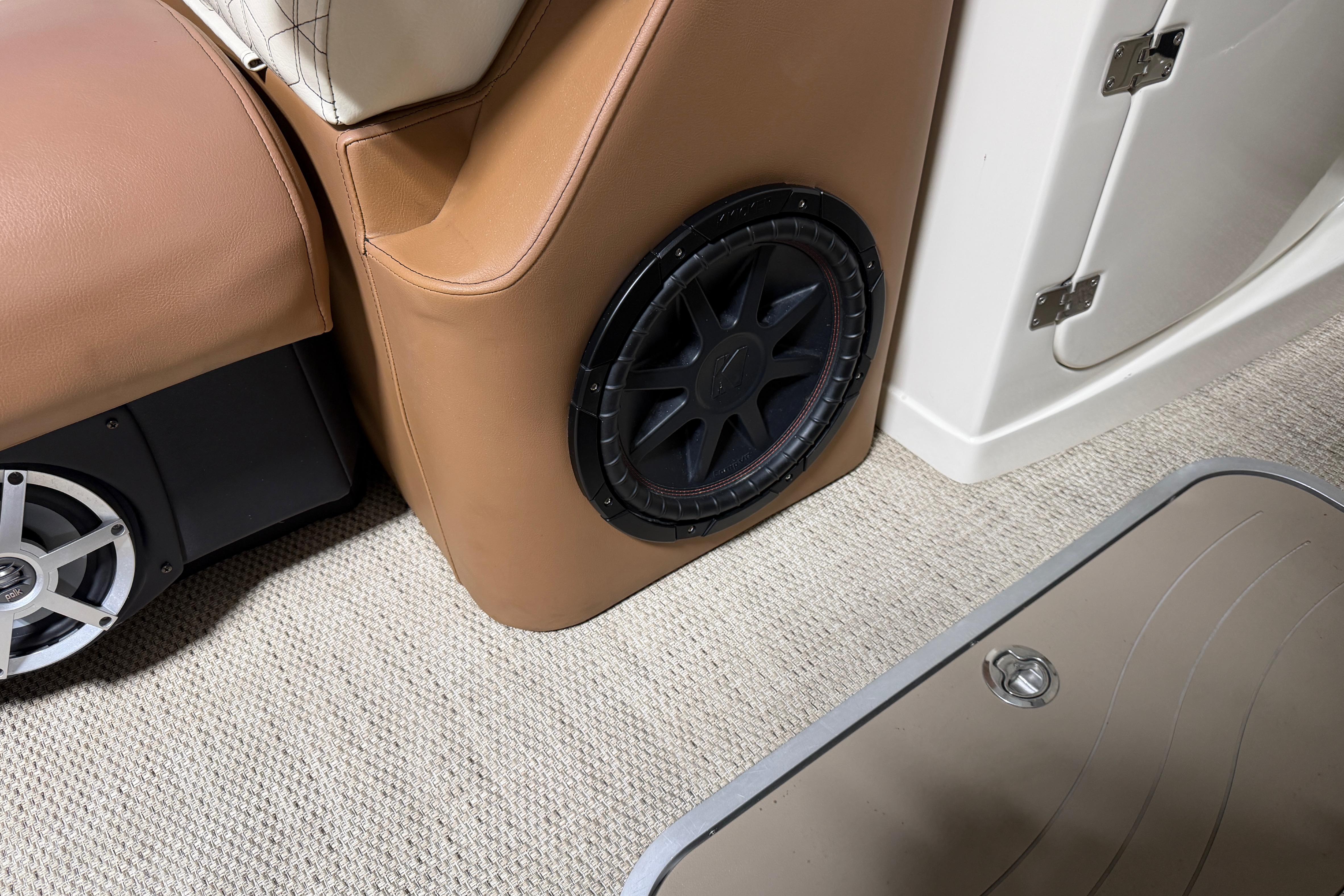 2018 Godfrey Sanpan 2500 ULC interior with premium audio system and beige upholstery.