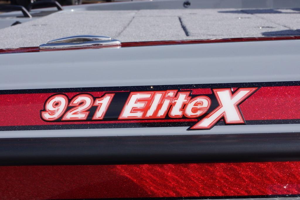 Phoenix 921 Elite X 2026 model logo on a sleek red surface.