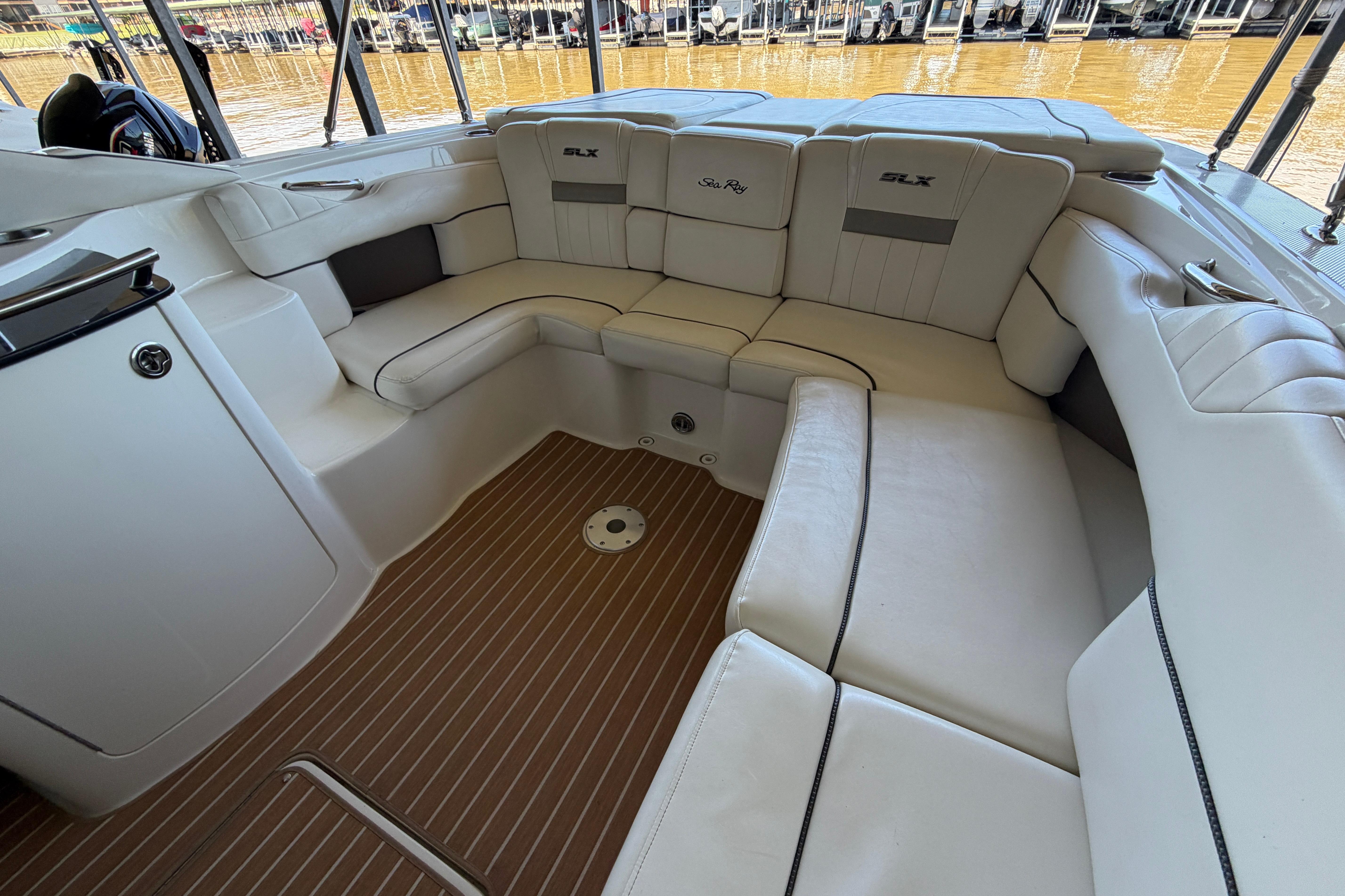 Luxurious 2007 Sea Ray 270 SLX boat interior with plush seating and elegant design.