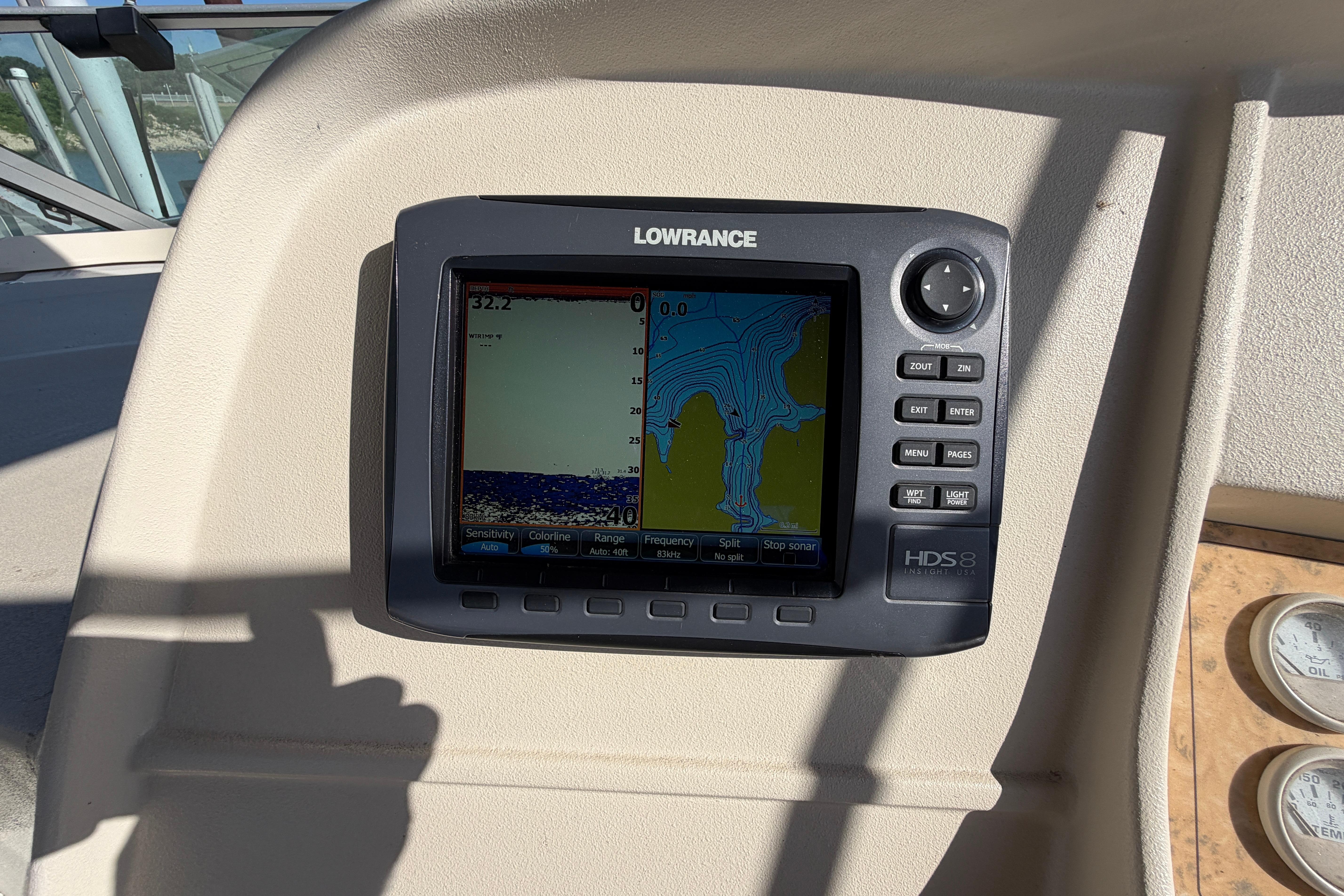 Lowrance HDS-8 marine GPS on 1997 Cruisers 3575 dashboard, displaying navigation data.
