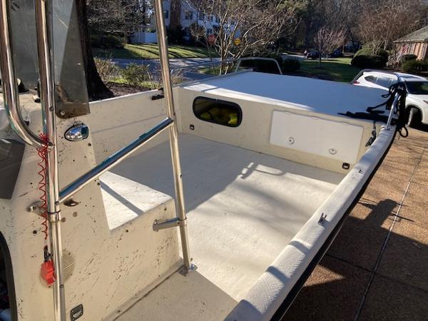1997 Carolina Skiff 198 DLV boat interior, showing spacious deck and railing.